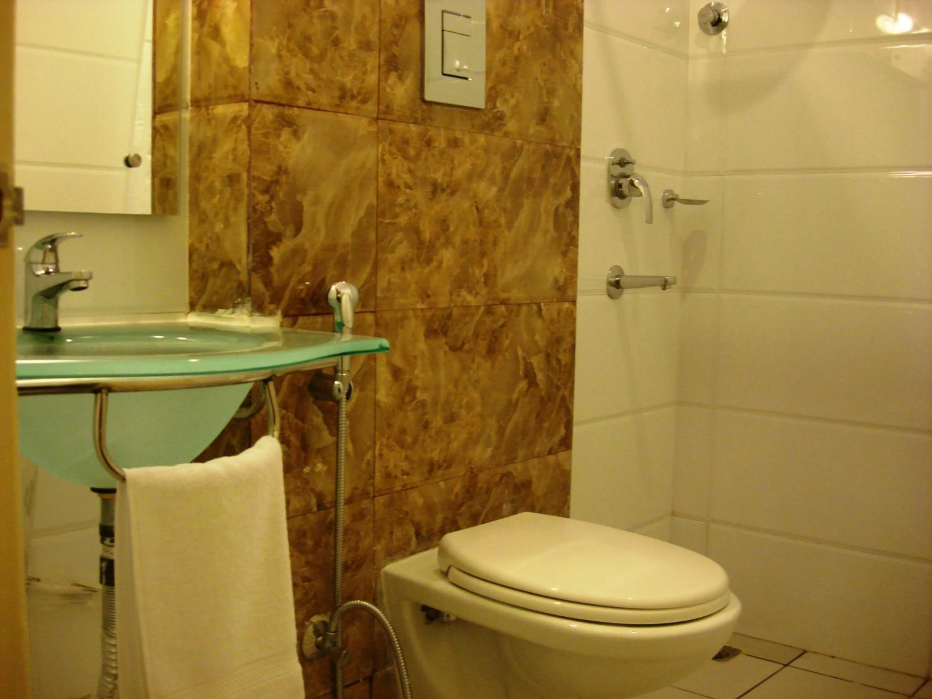 Bathroom in Aishwarya Suites
