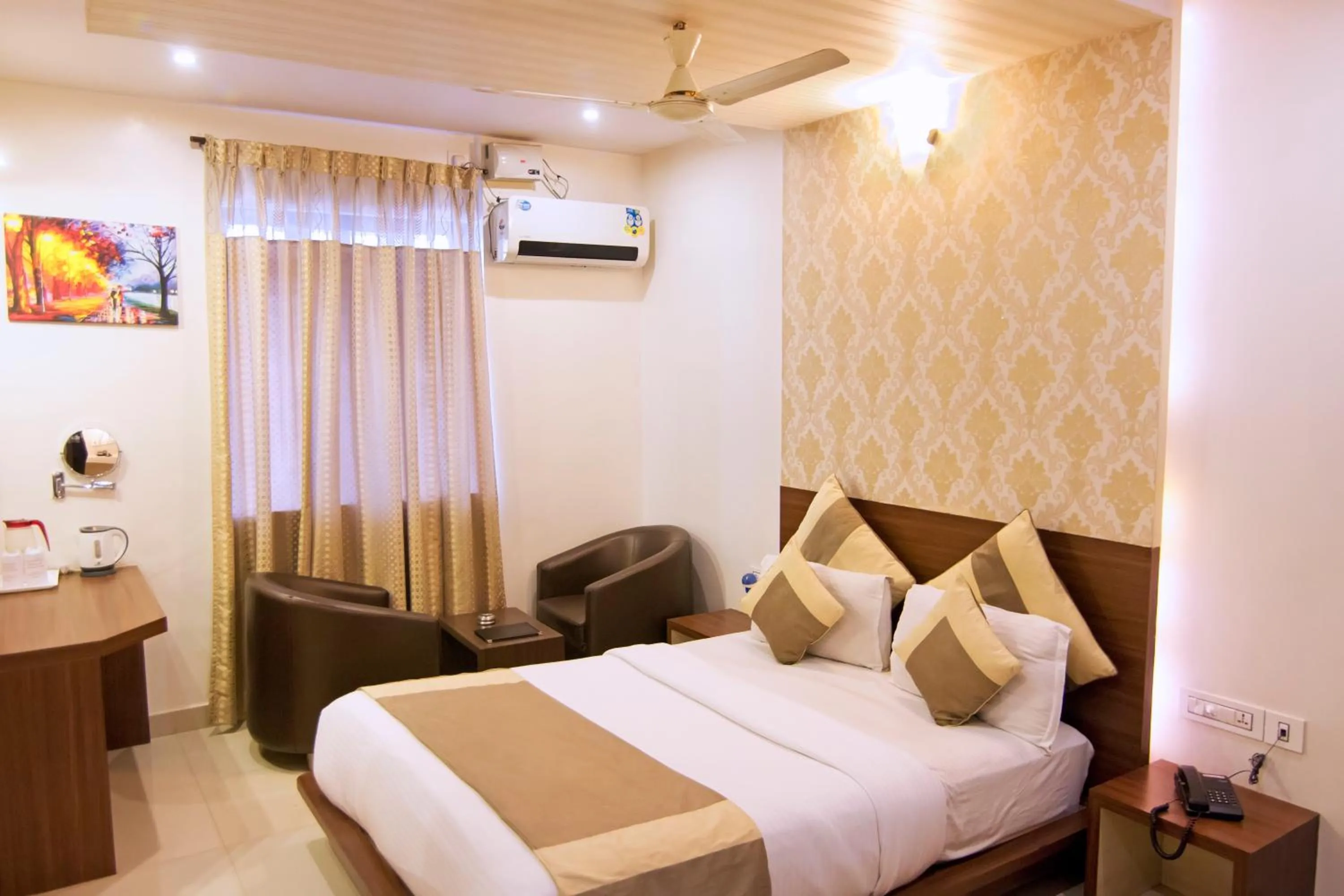 Bed in Aishwarya Suites