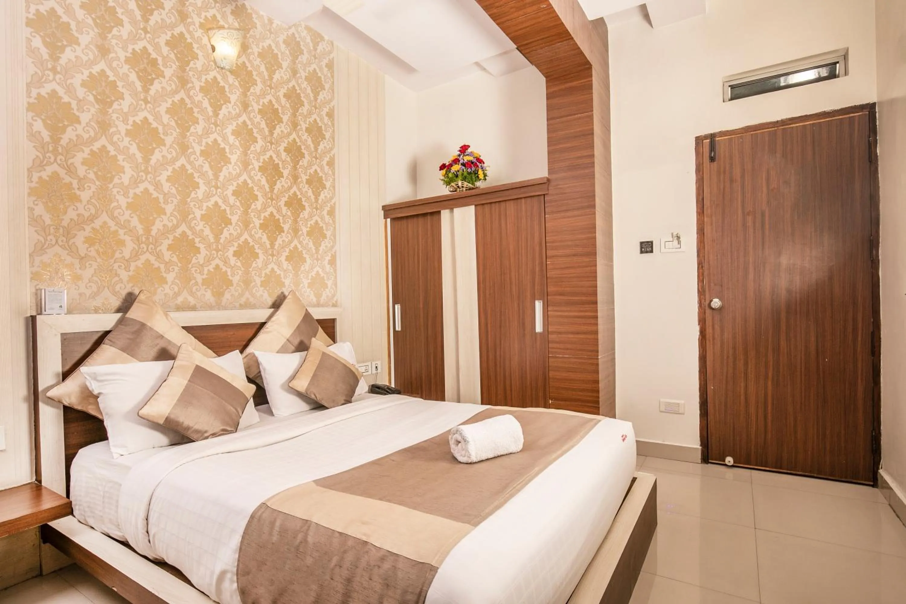 Bed in Aishwarya Suites