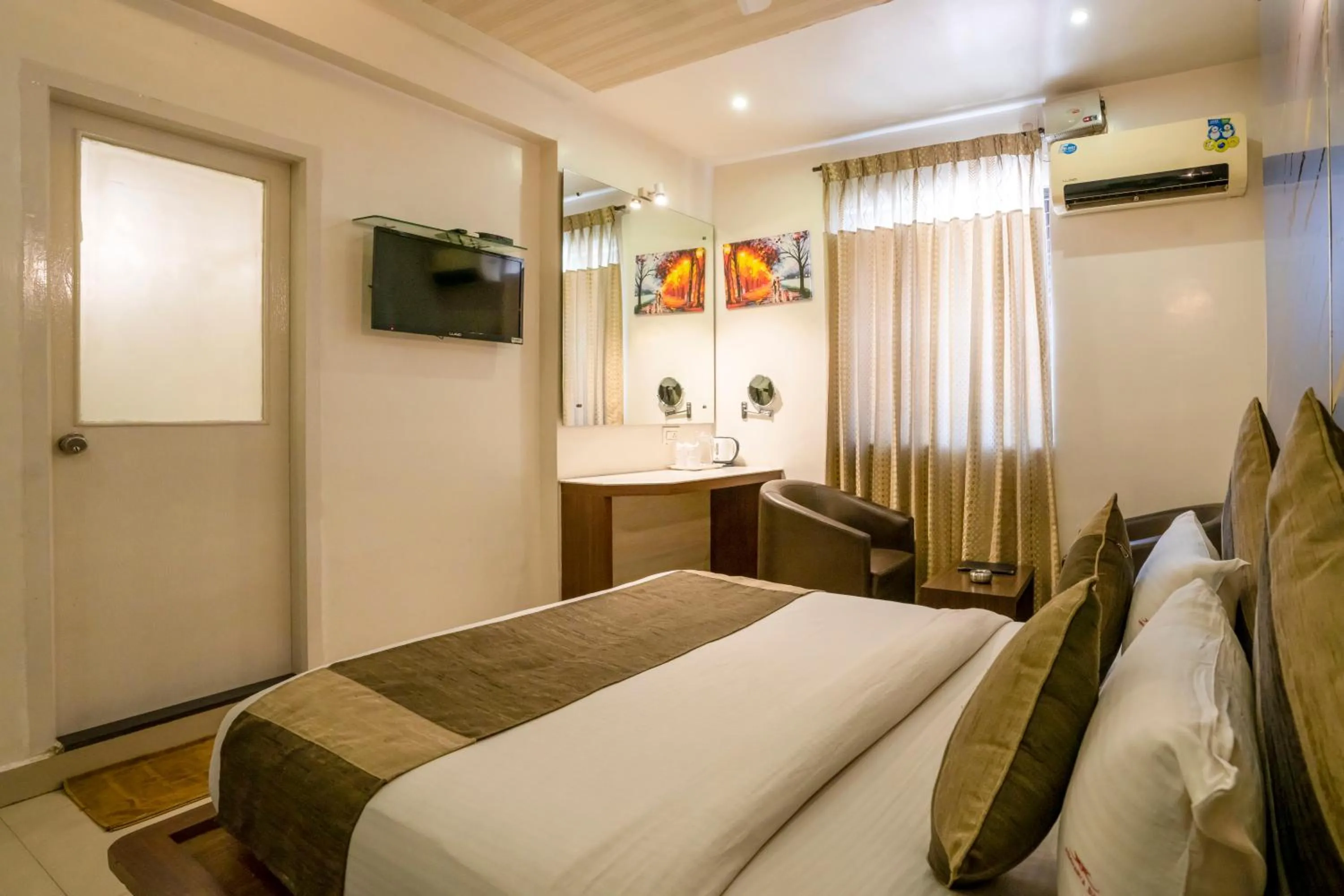 Bed in Aishwarya Suites