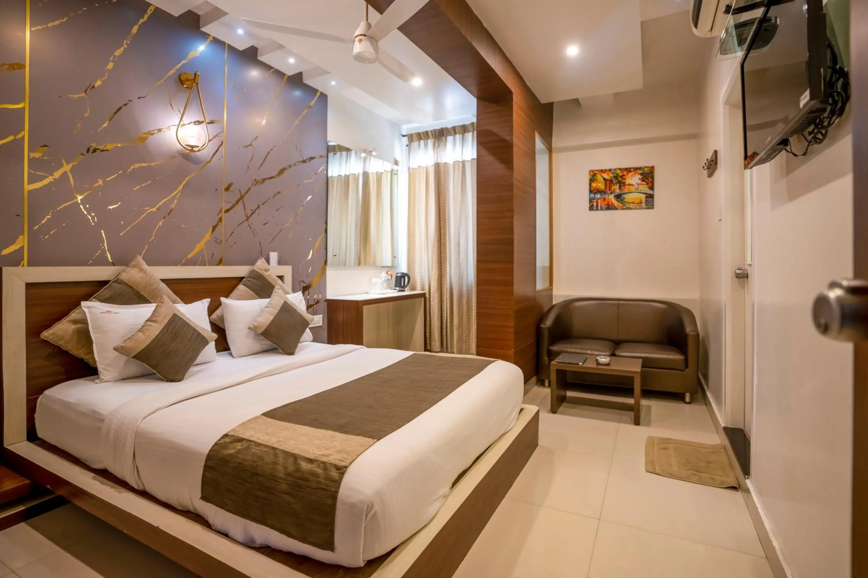 Bed in Aishwarya Suites