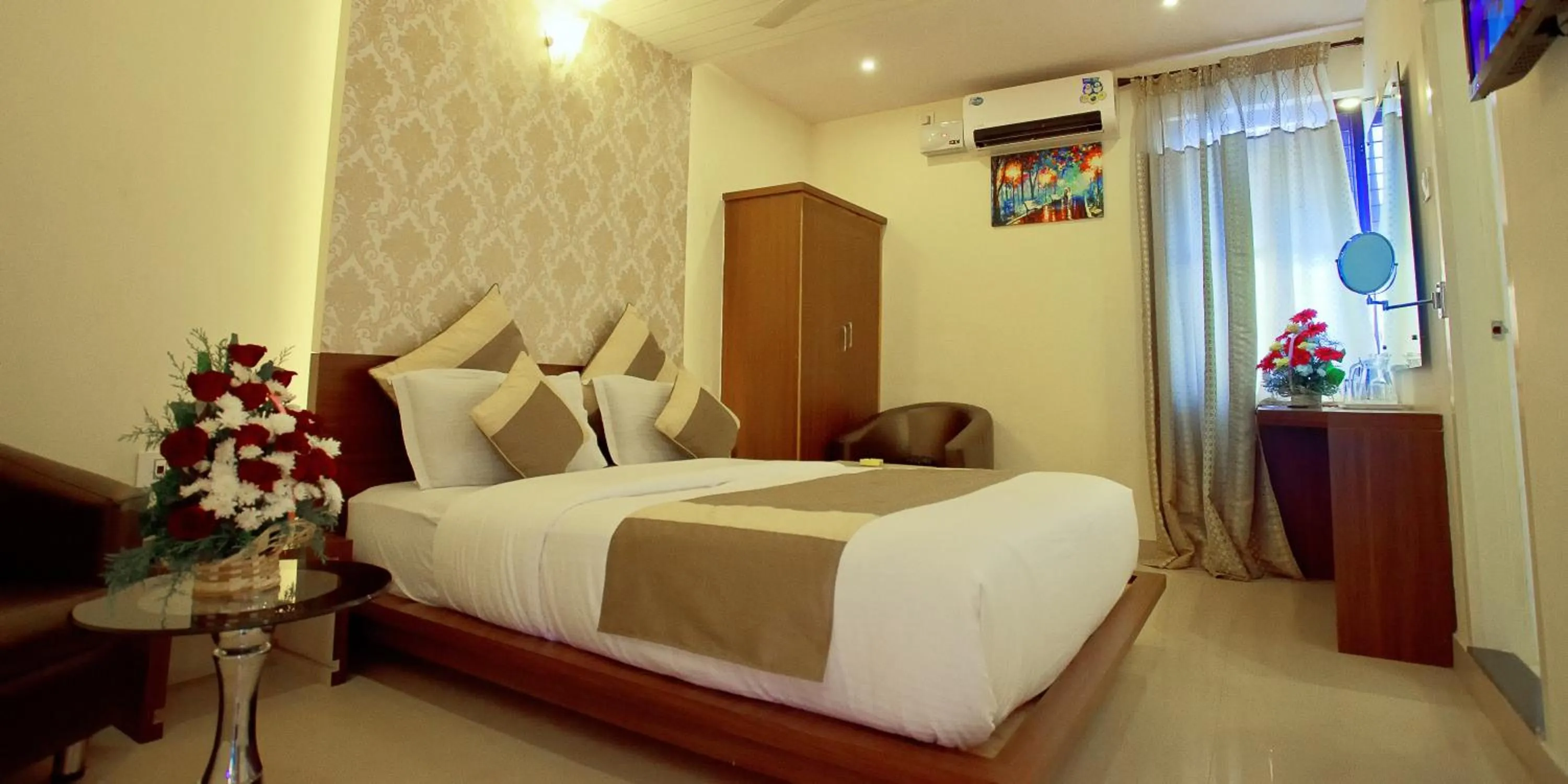 Bed in Aishwarya Suites