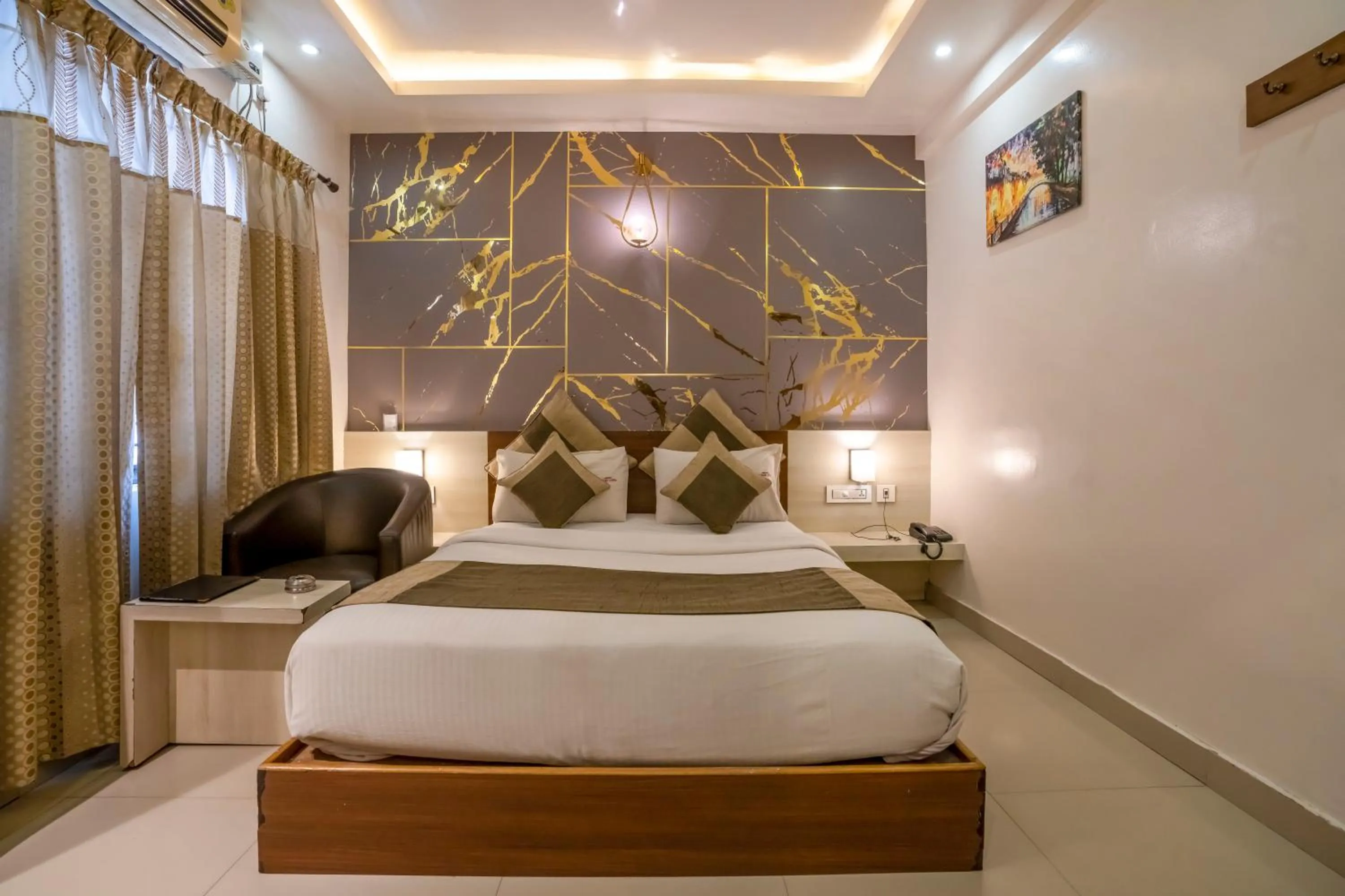 Bed in Aishwarya Suites