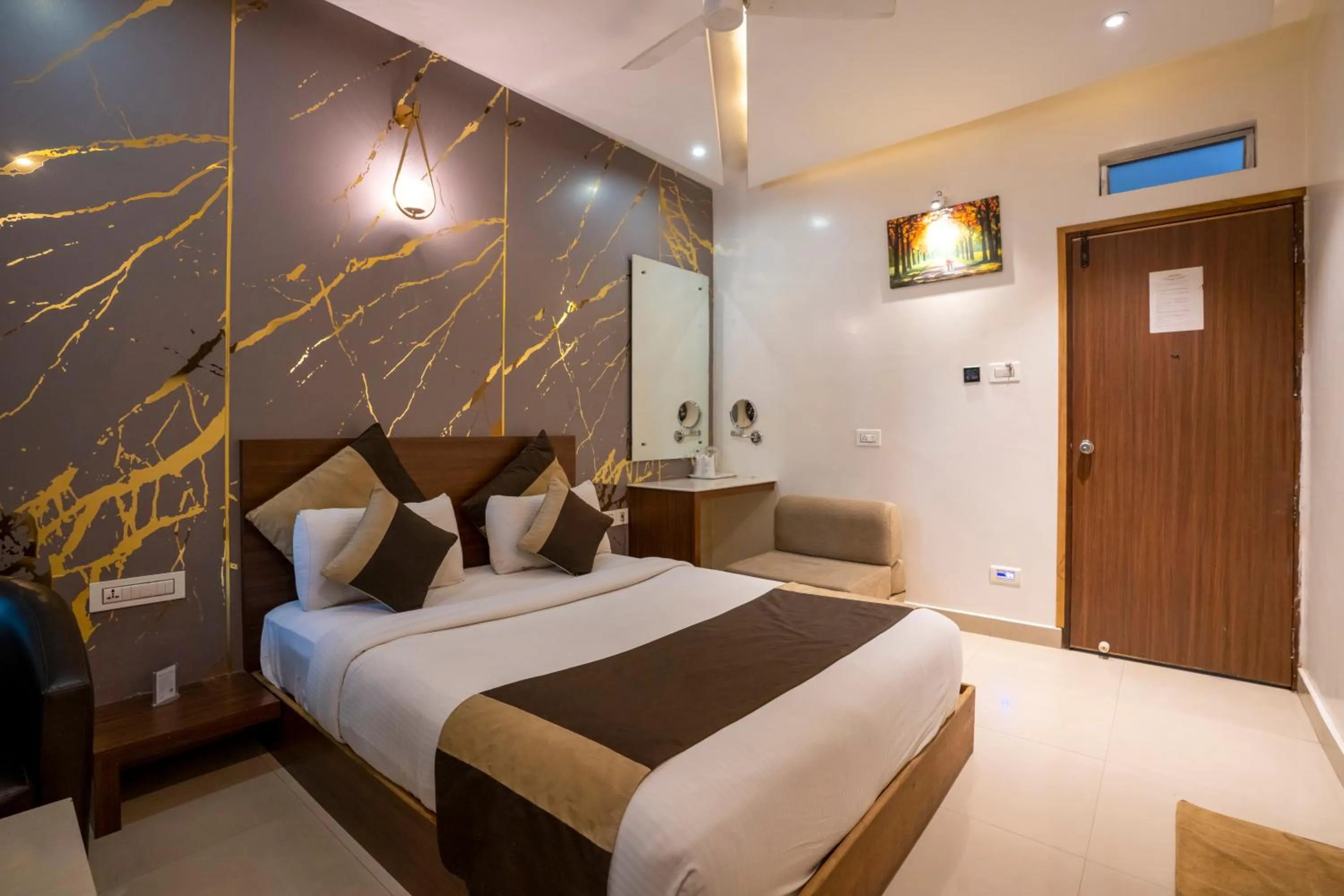 Bed in Aishwarya Suites
