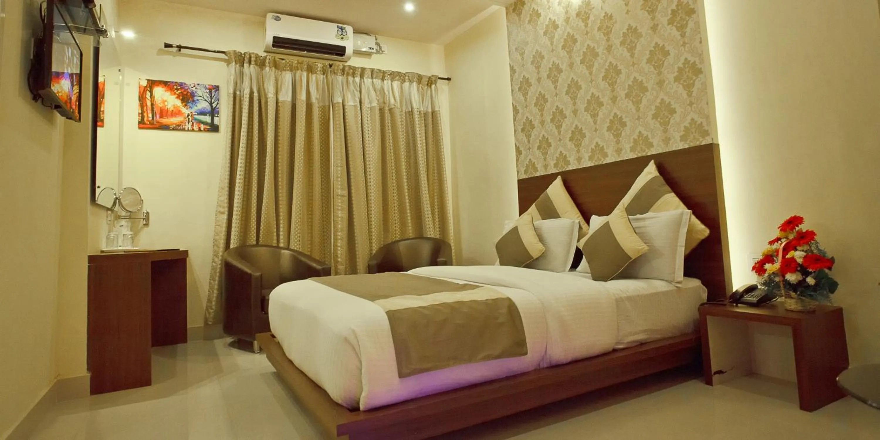 Bed in Aishwarya Suites