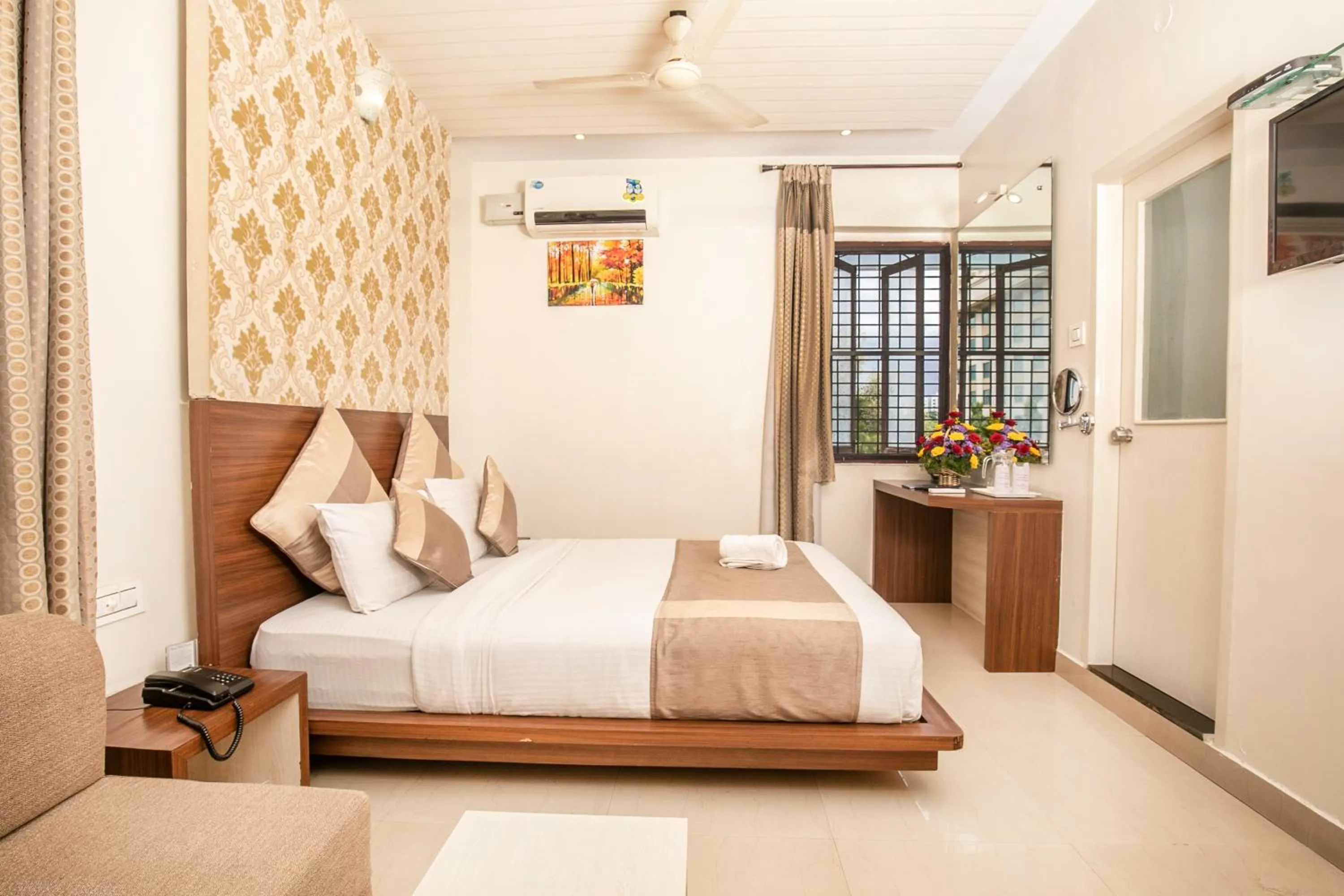 Bed in Aishwarya Suites