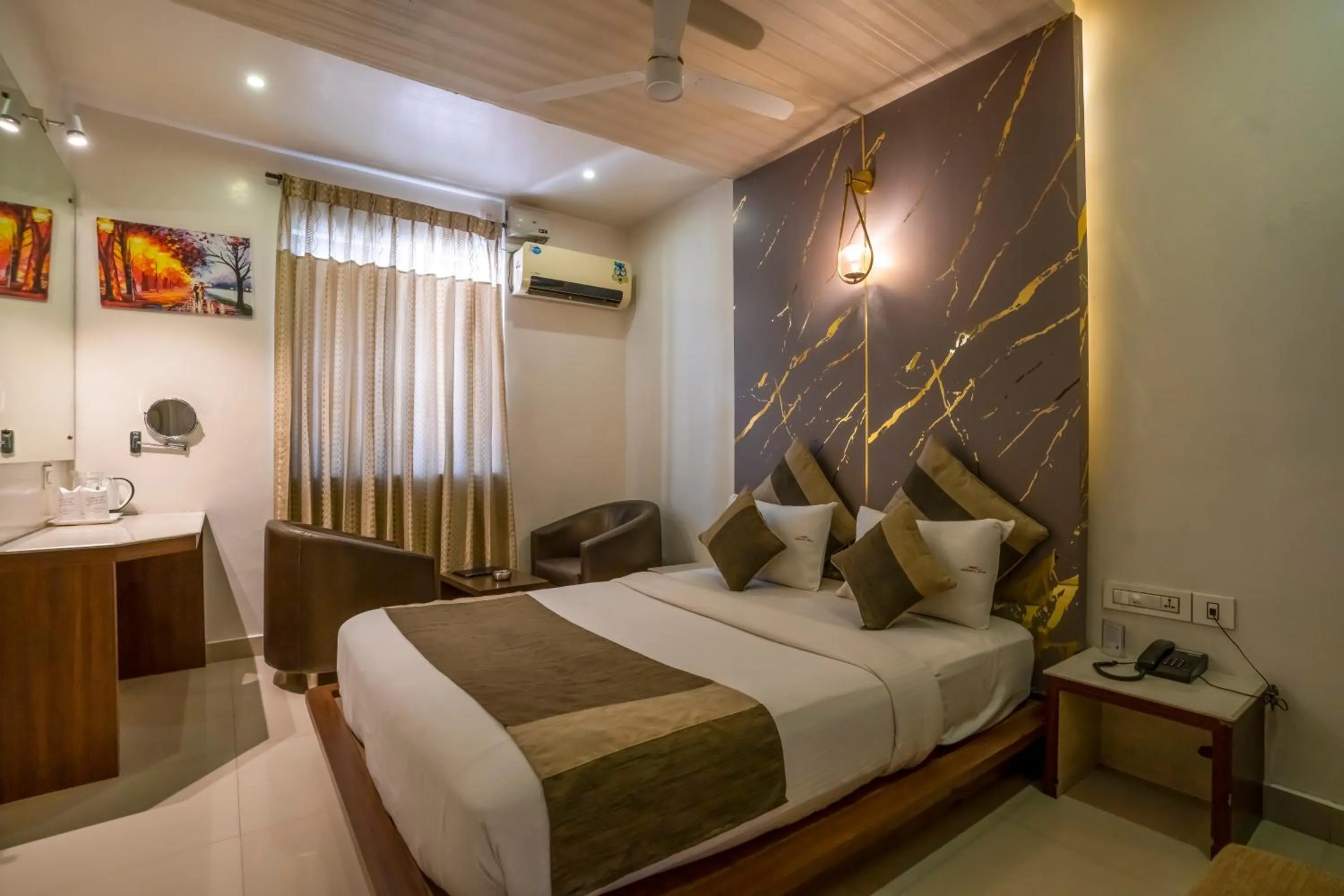 Bed in Aishwarya Suites