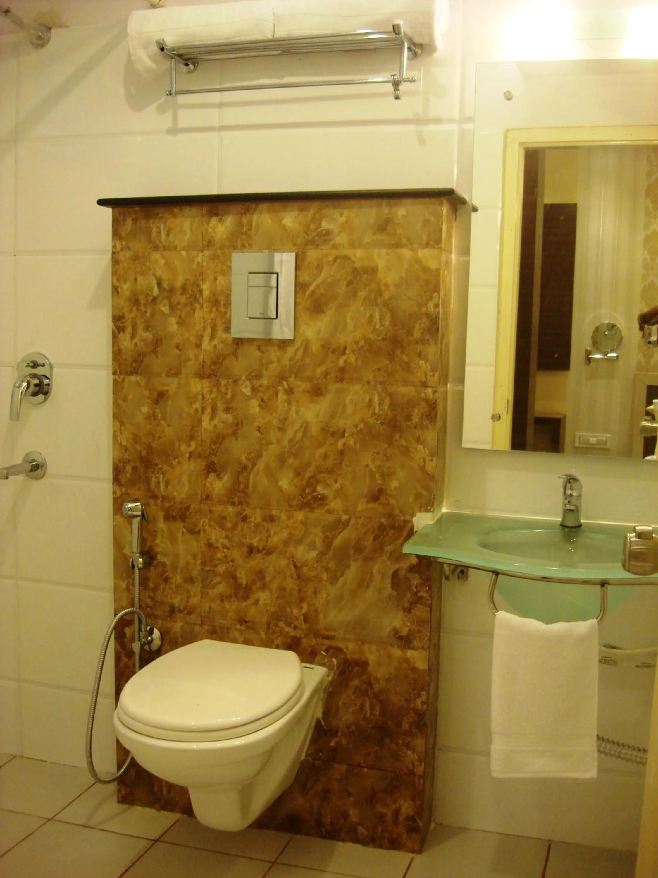 Bathroom in Aishwarya Suites