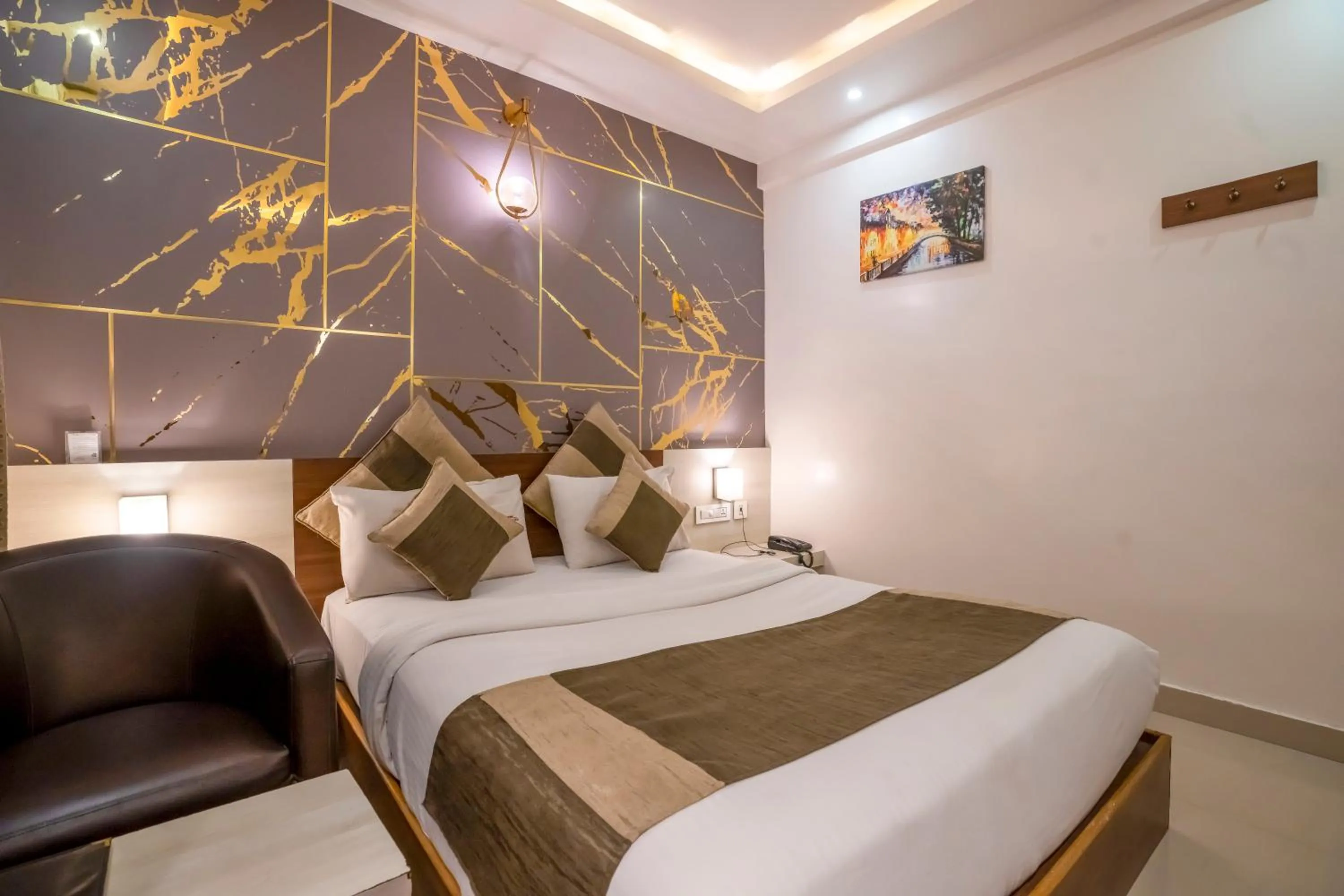 Bed in Aishwarya Suites