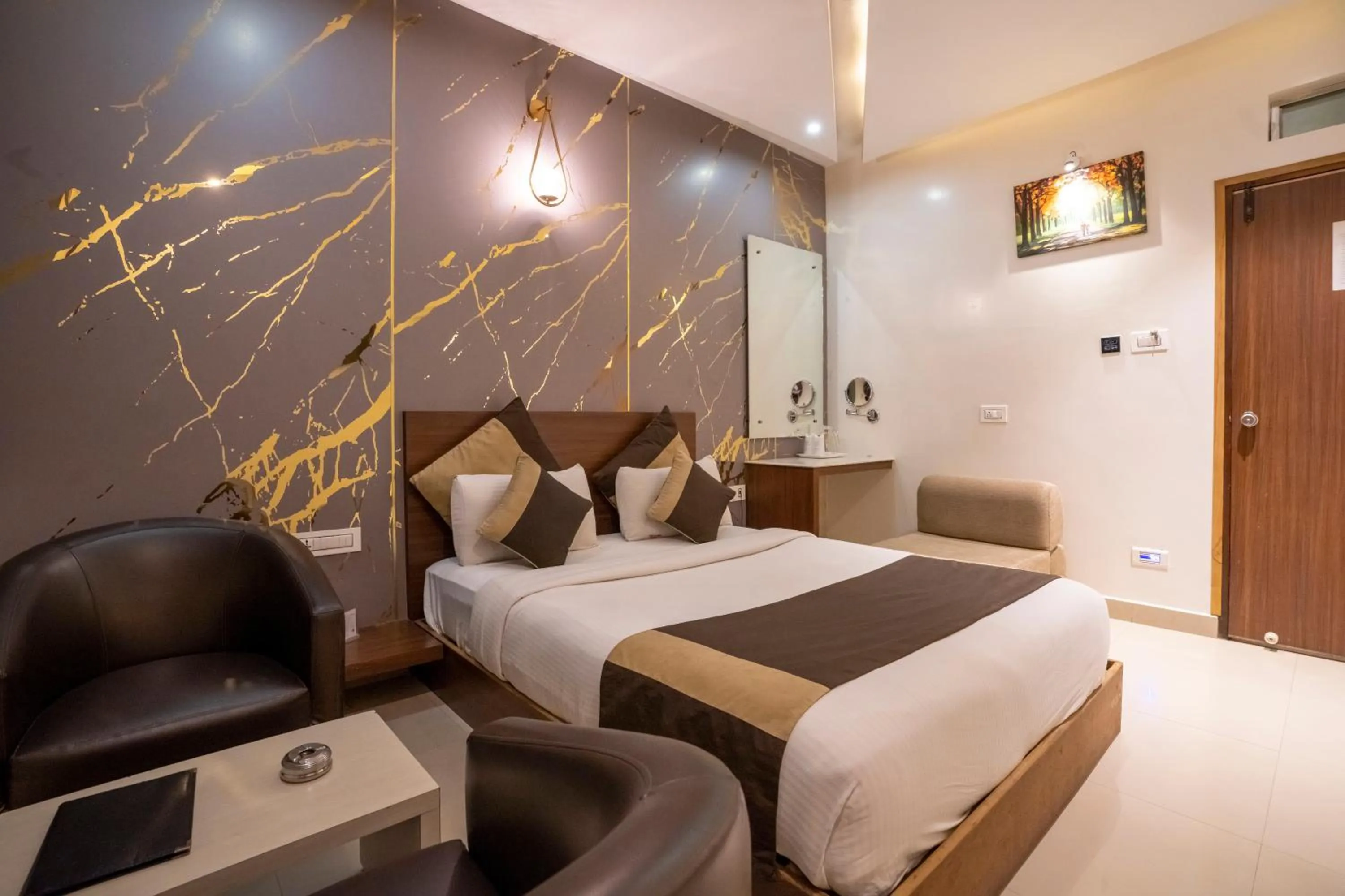 Bed in Aishwarya Suites