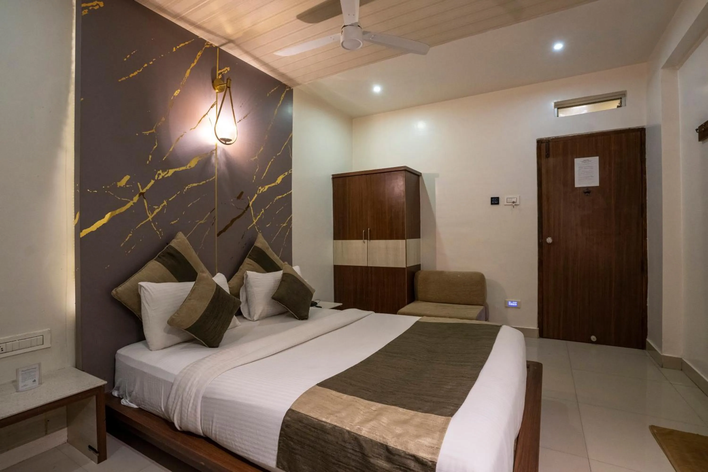 Bed in Aishwarya Suites