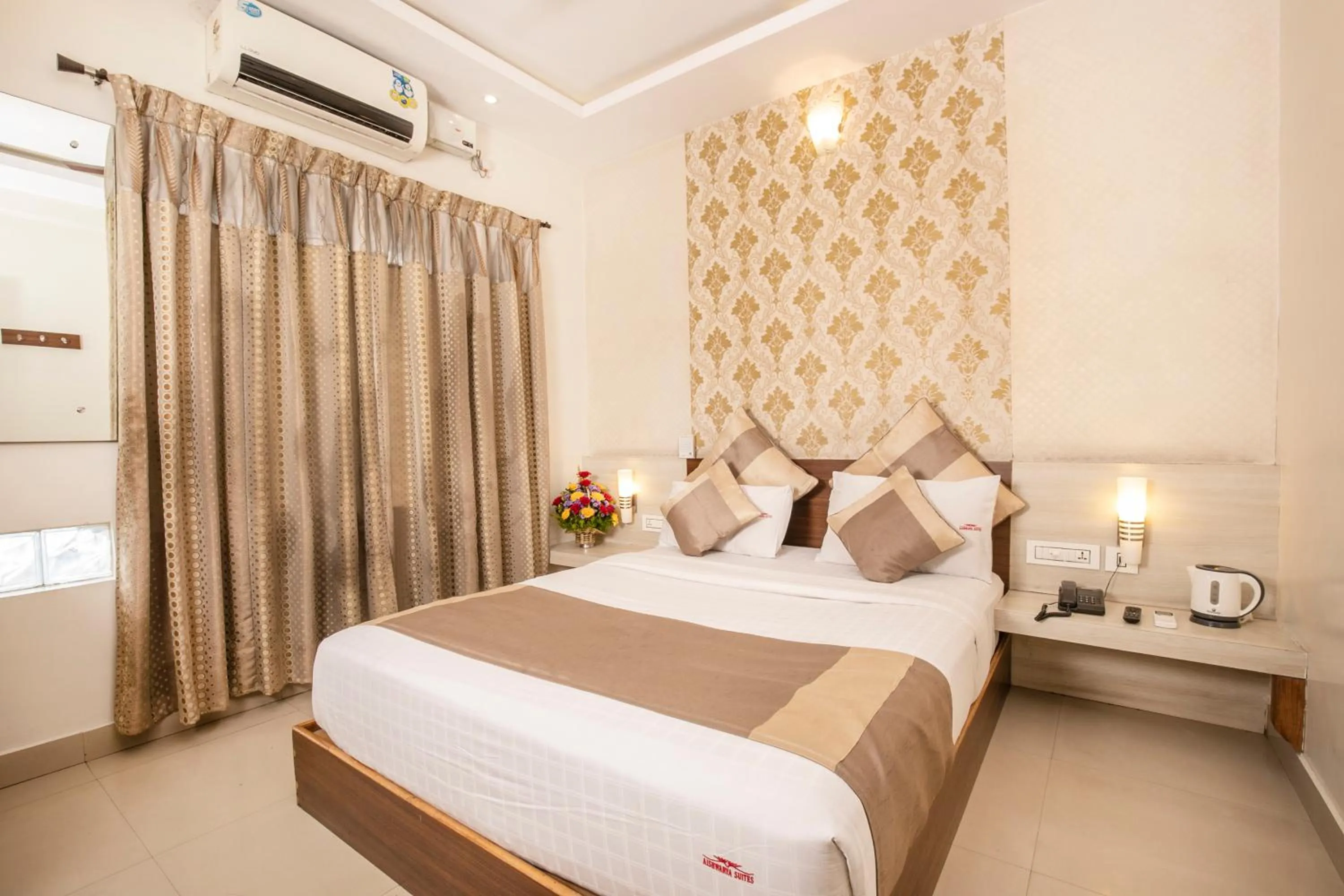 Bed in Aishwarya Suites