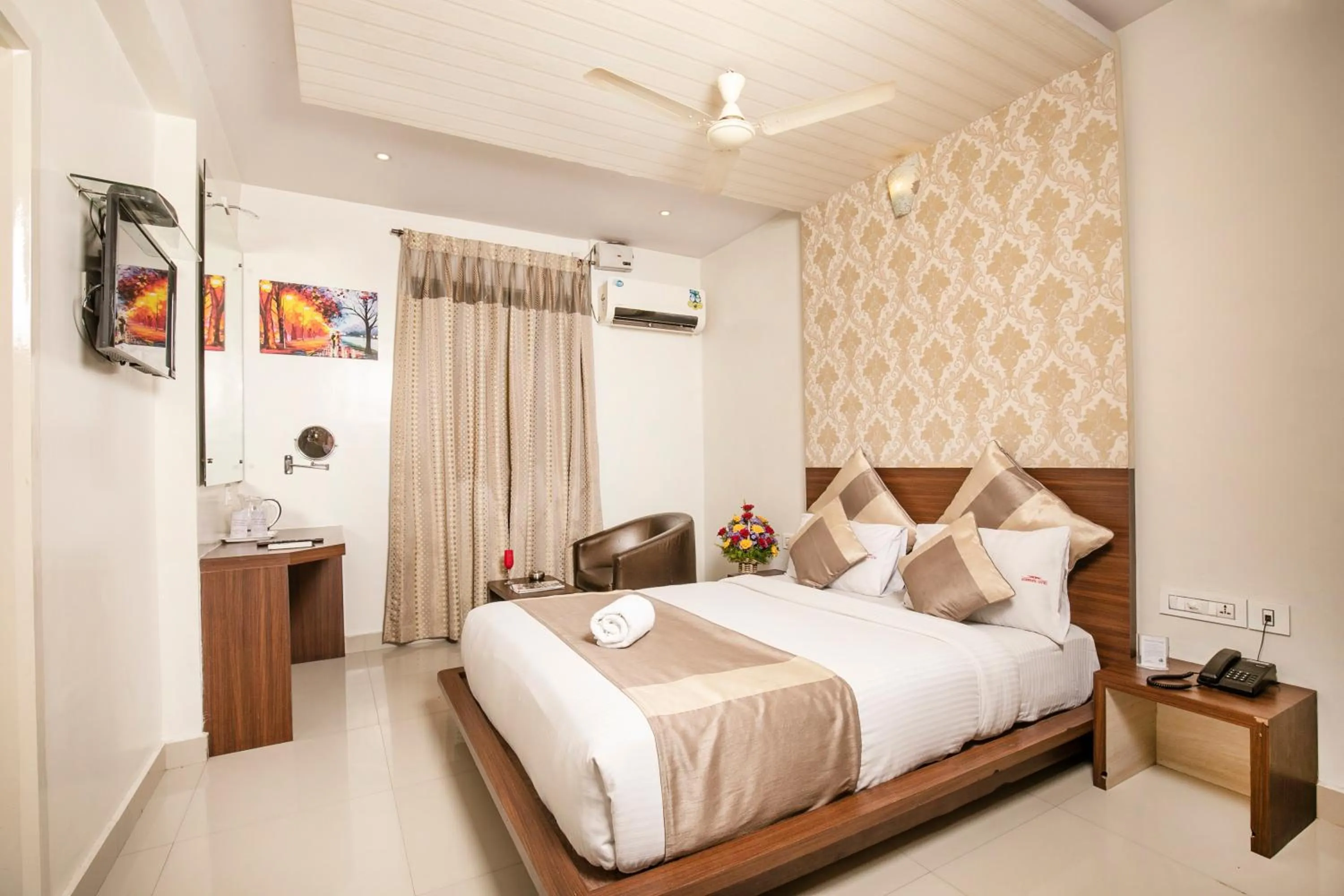 Bed in Aishwarya Suites