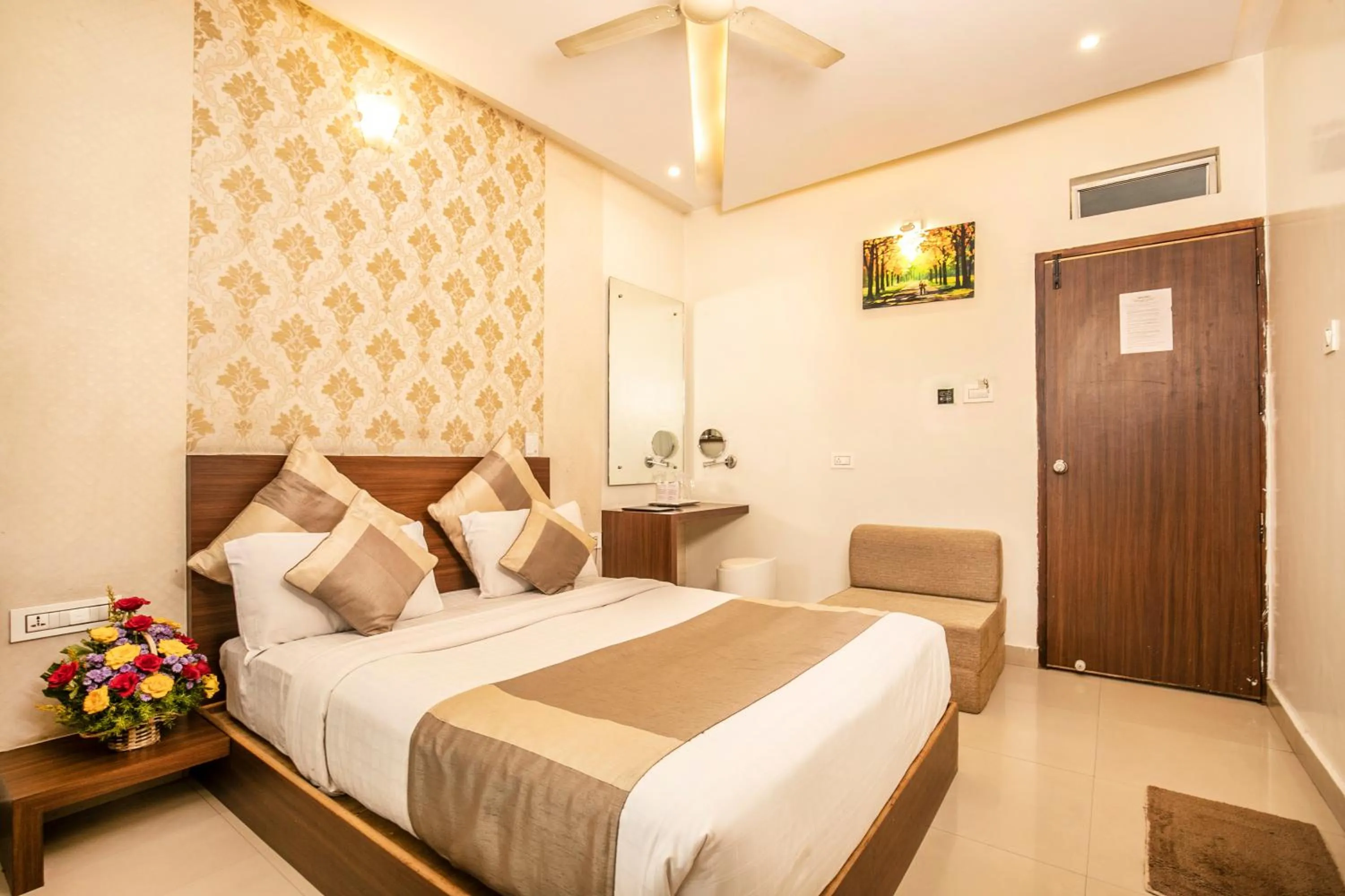 Bed in Aishwarya Suites