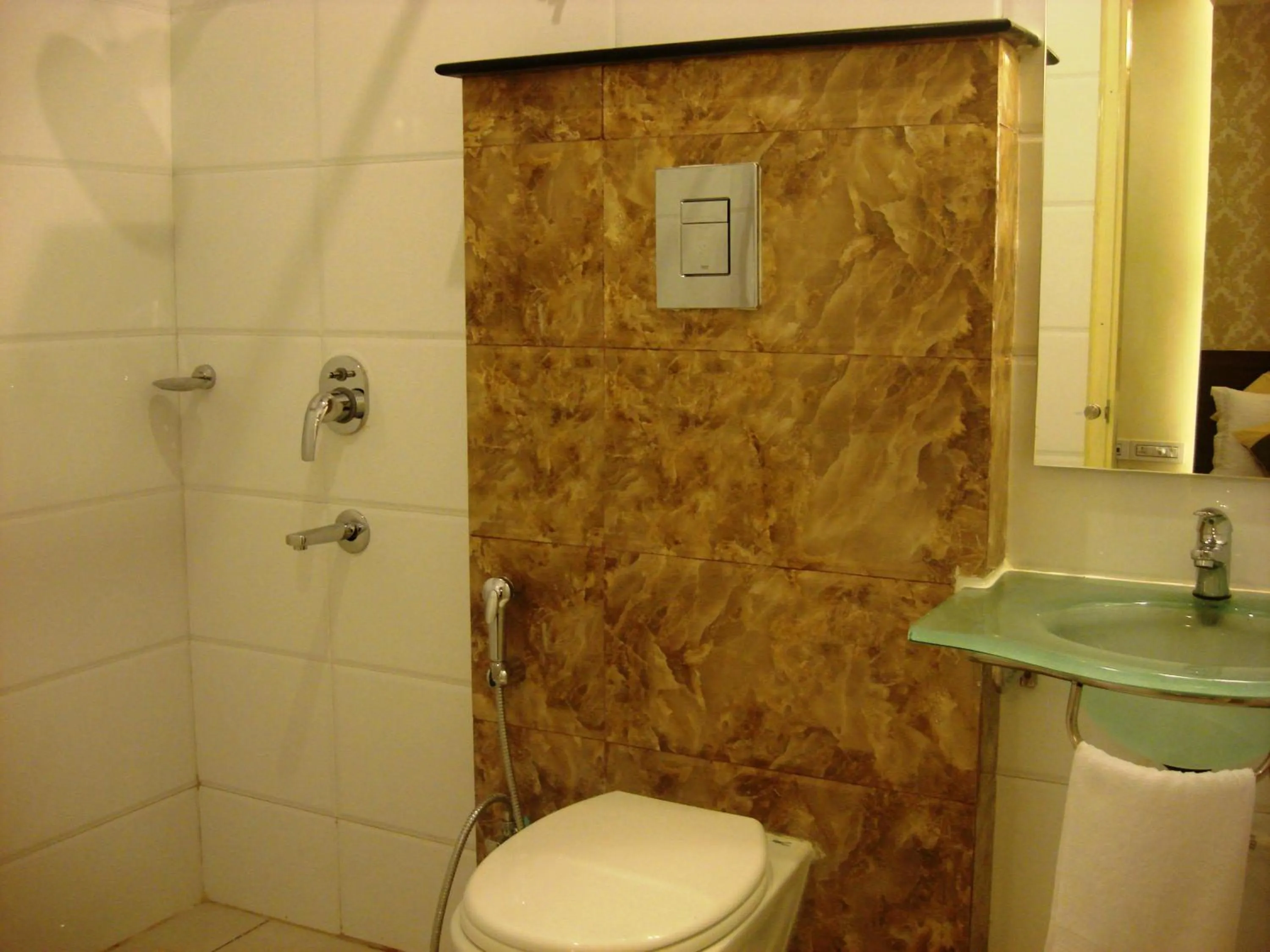 Bathroom in Aishwarya Suites
