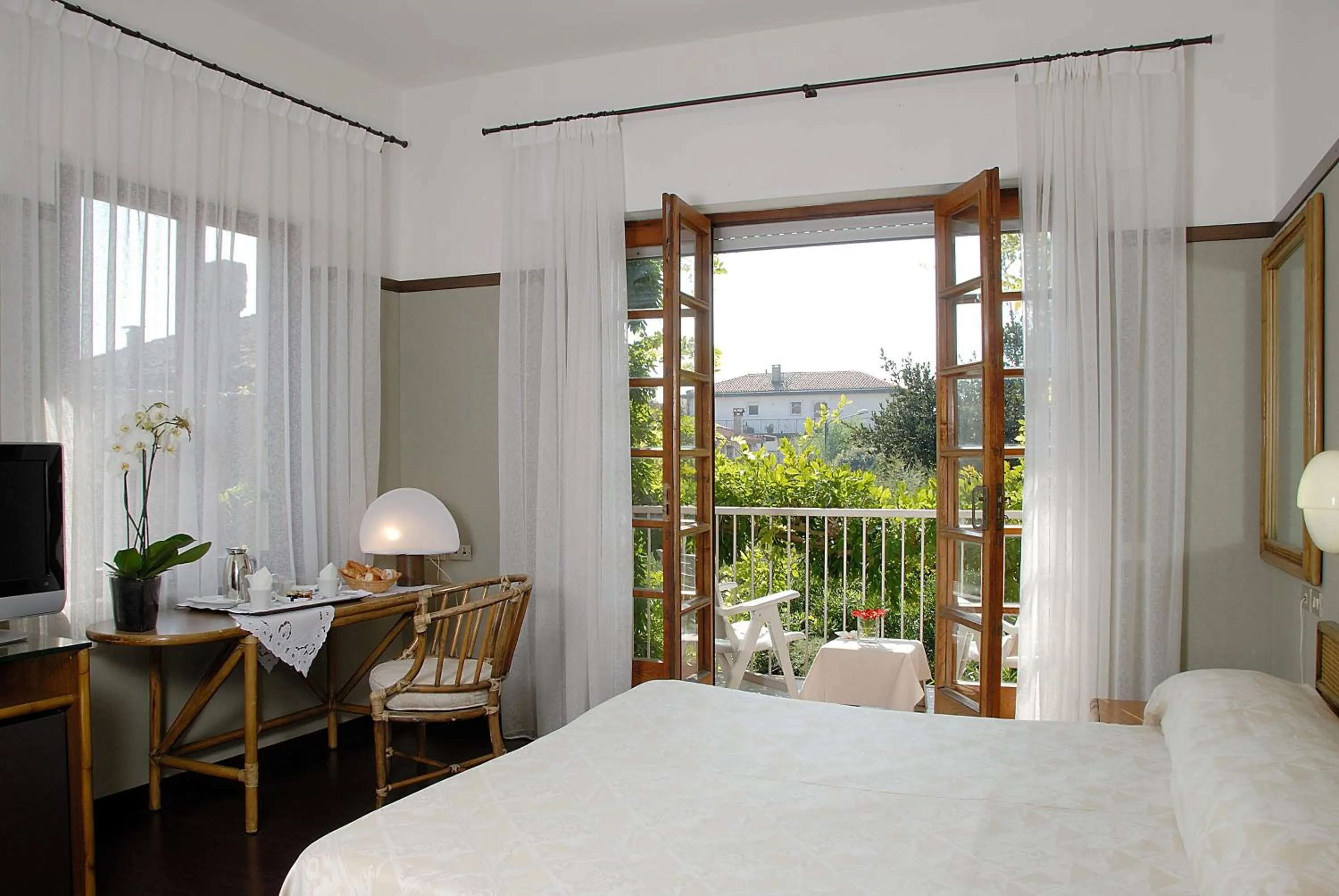 Balcony/Terrace, Bed in Hotel Villa Mabapa