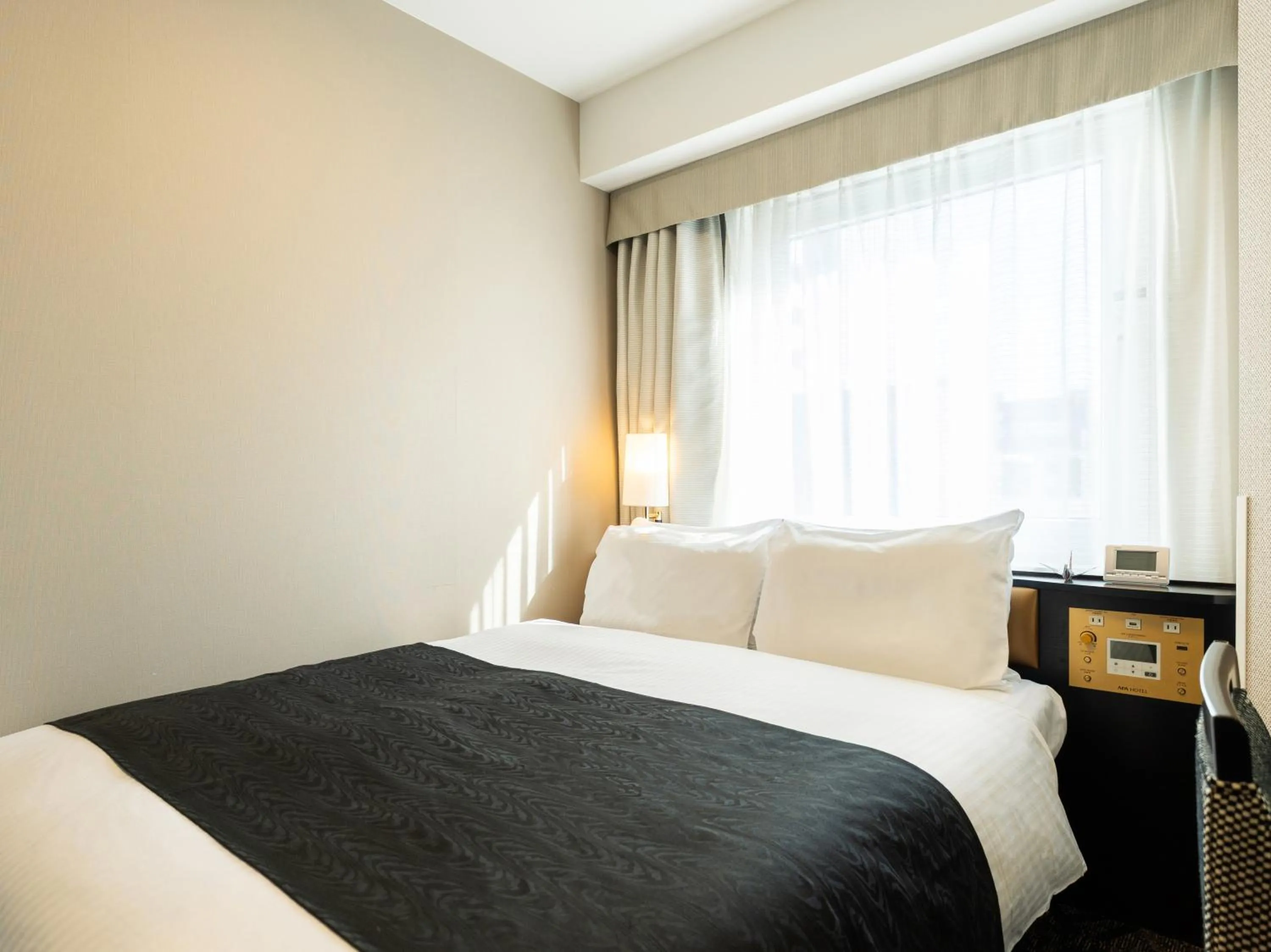 Photo of the whole room, Bed in APA Hotel Namba Shinsaibashi Higashi