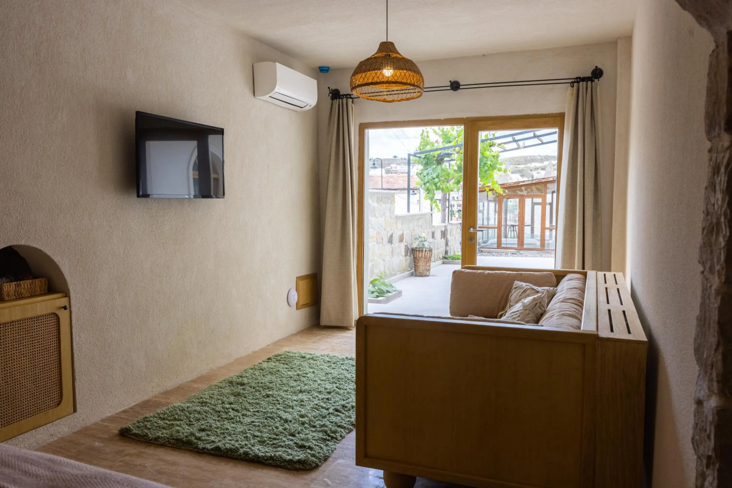 Seating area, Bed in Cappadocia Naif Hotel - Adults Only
