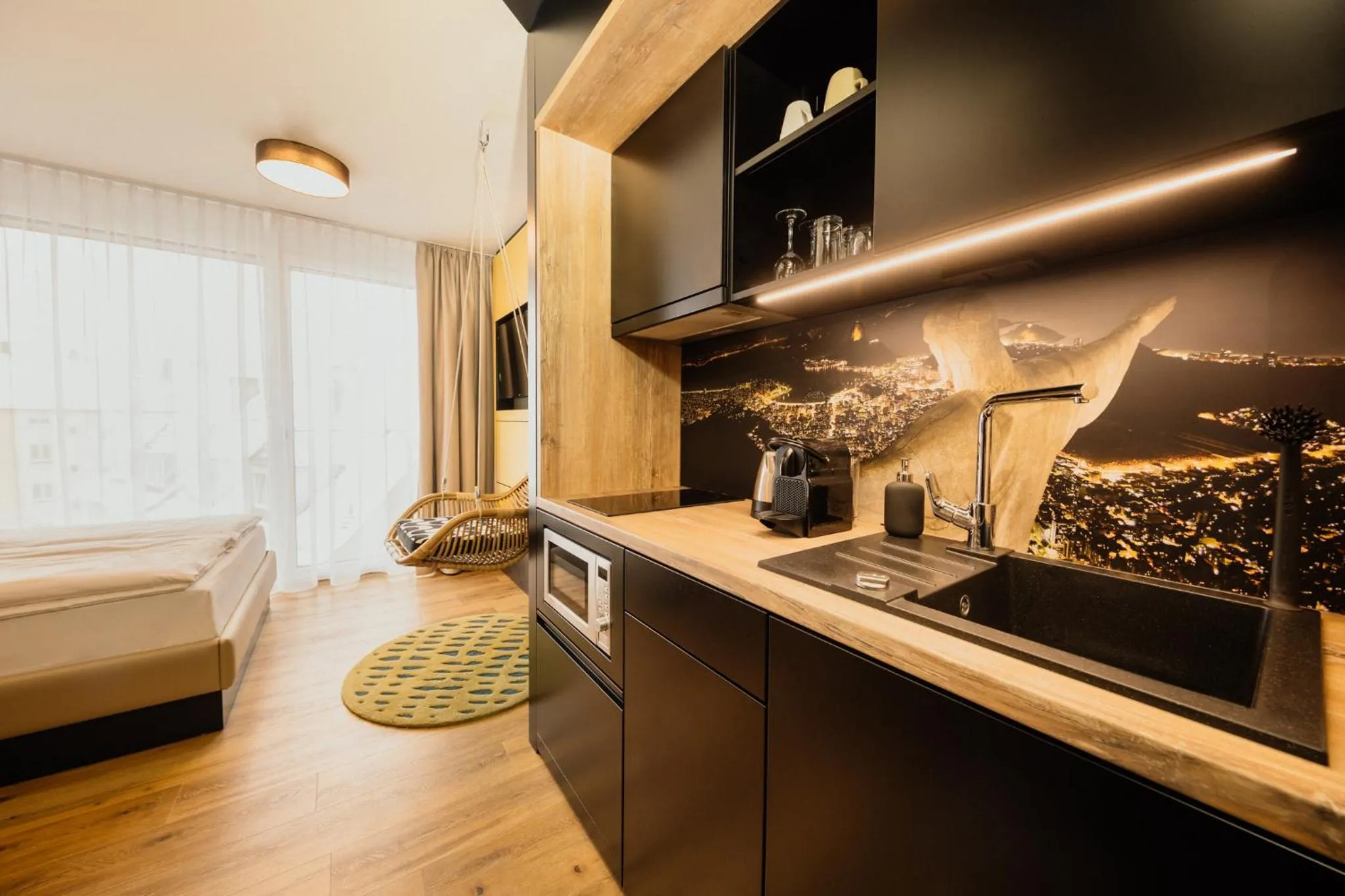 Kitchen or kitchenette, Bed in Rioca Neu-Ulm Posto 5