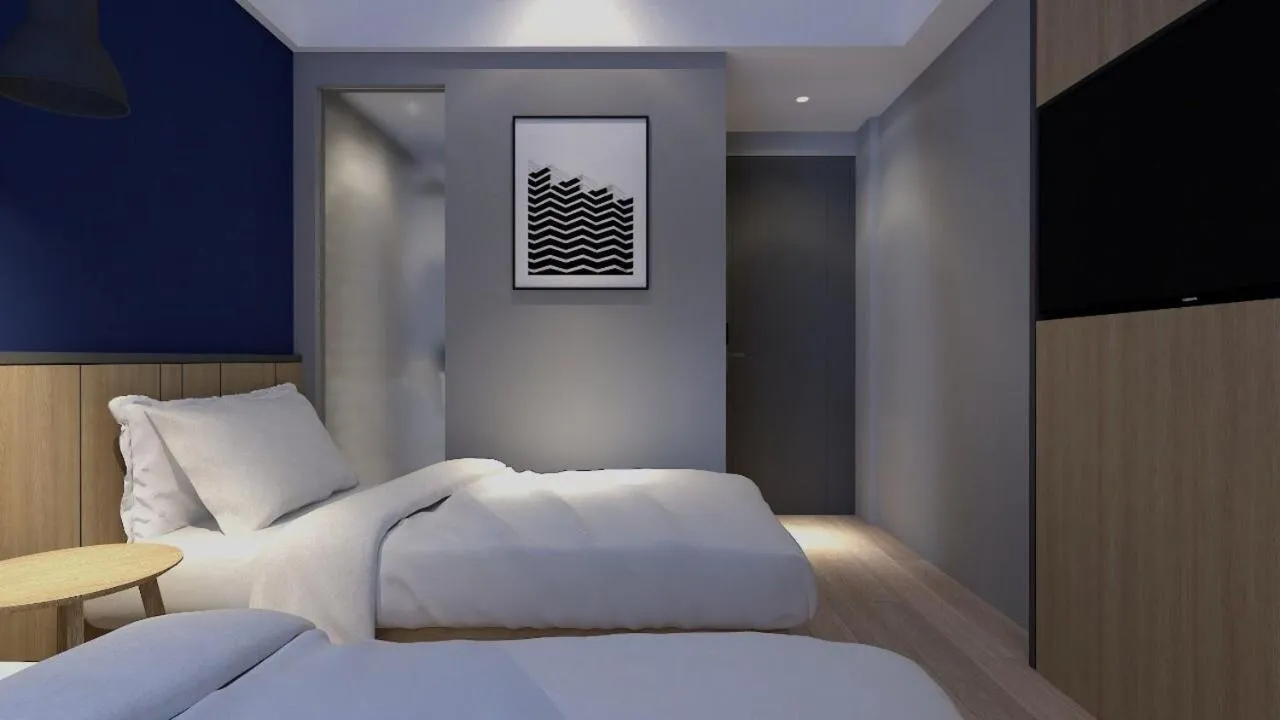 Bed in LeGreen Suite Sudirman