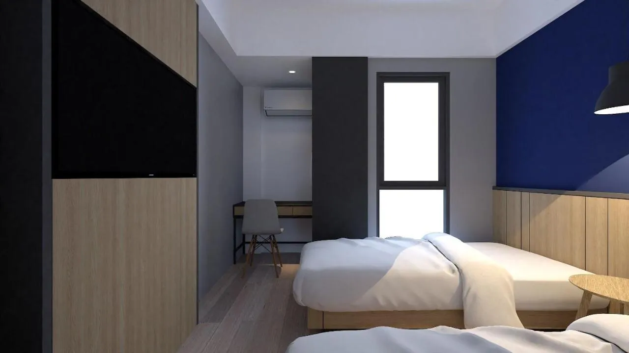 Bed in LeGreen Suite Sudirman