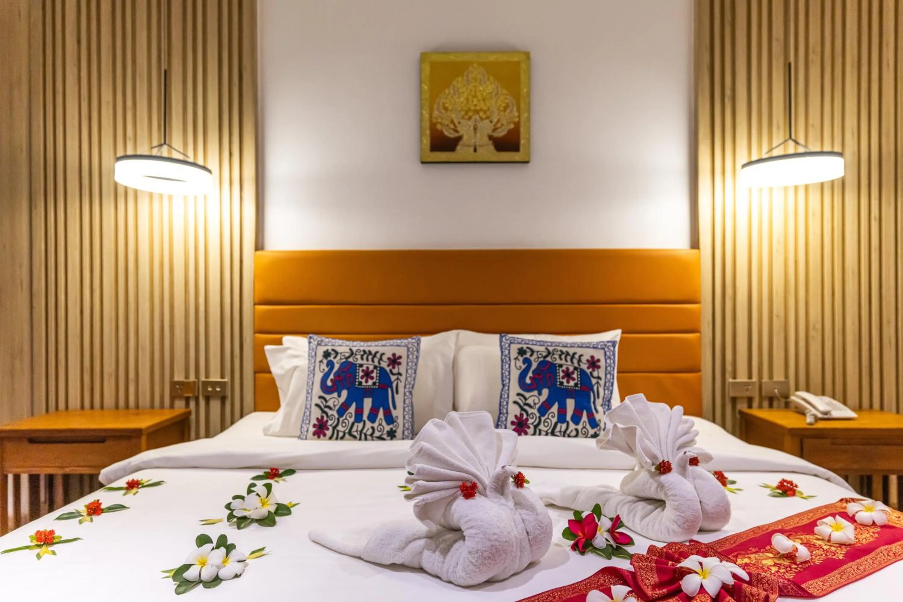 Bed in Royal Yao Yai Island Beach Resort