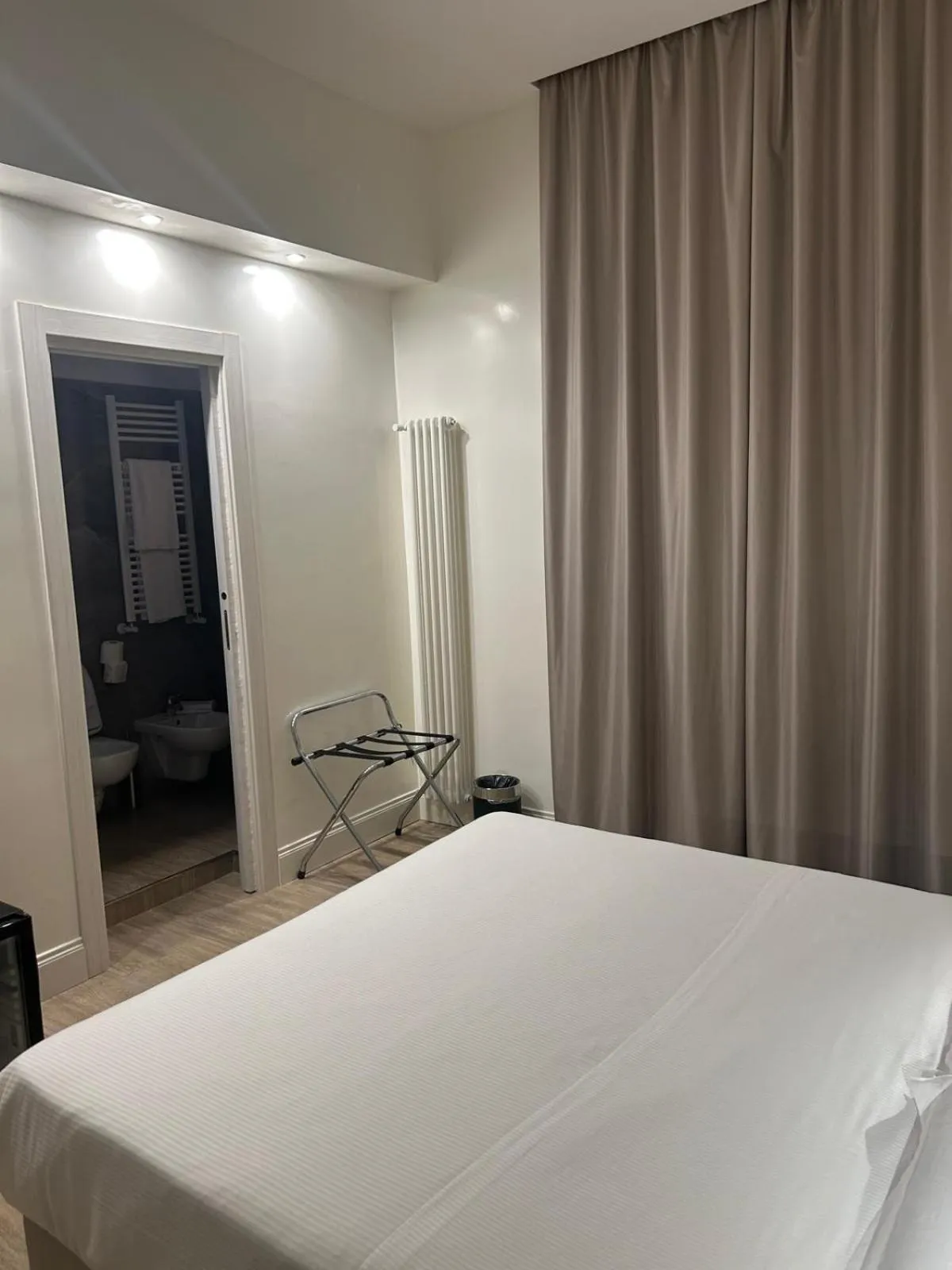 Bed in Hotel Aphrodite