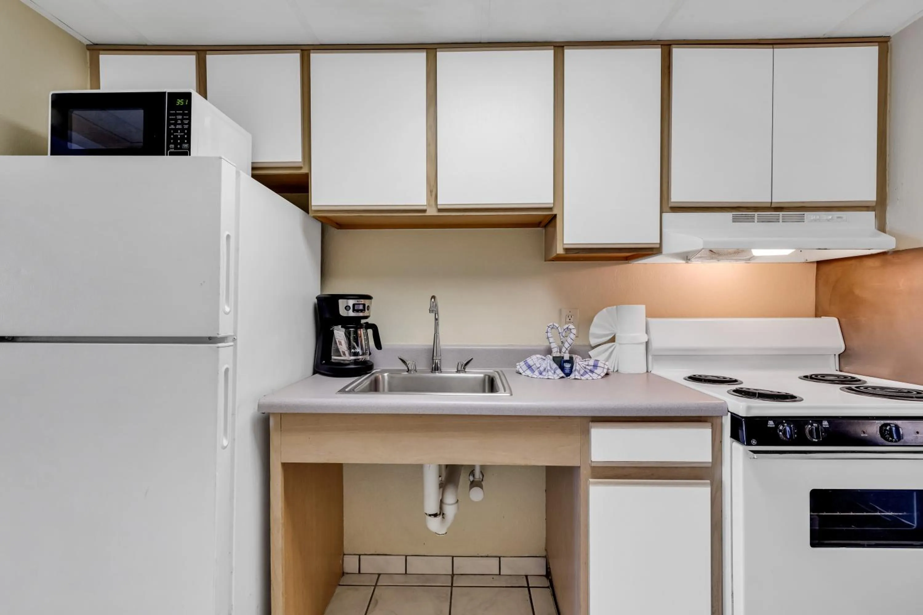 Kitchen or kitchenette in Oceanfront Boardwalk Condo w Private Balcony and Beach