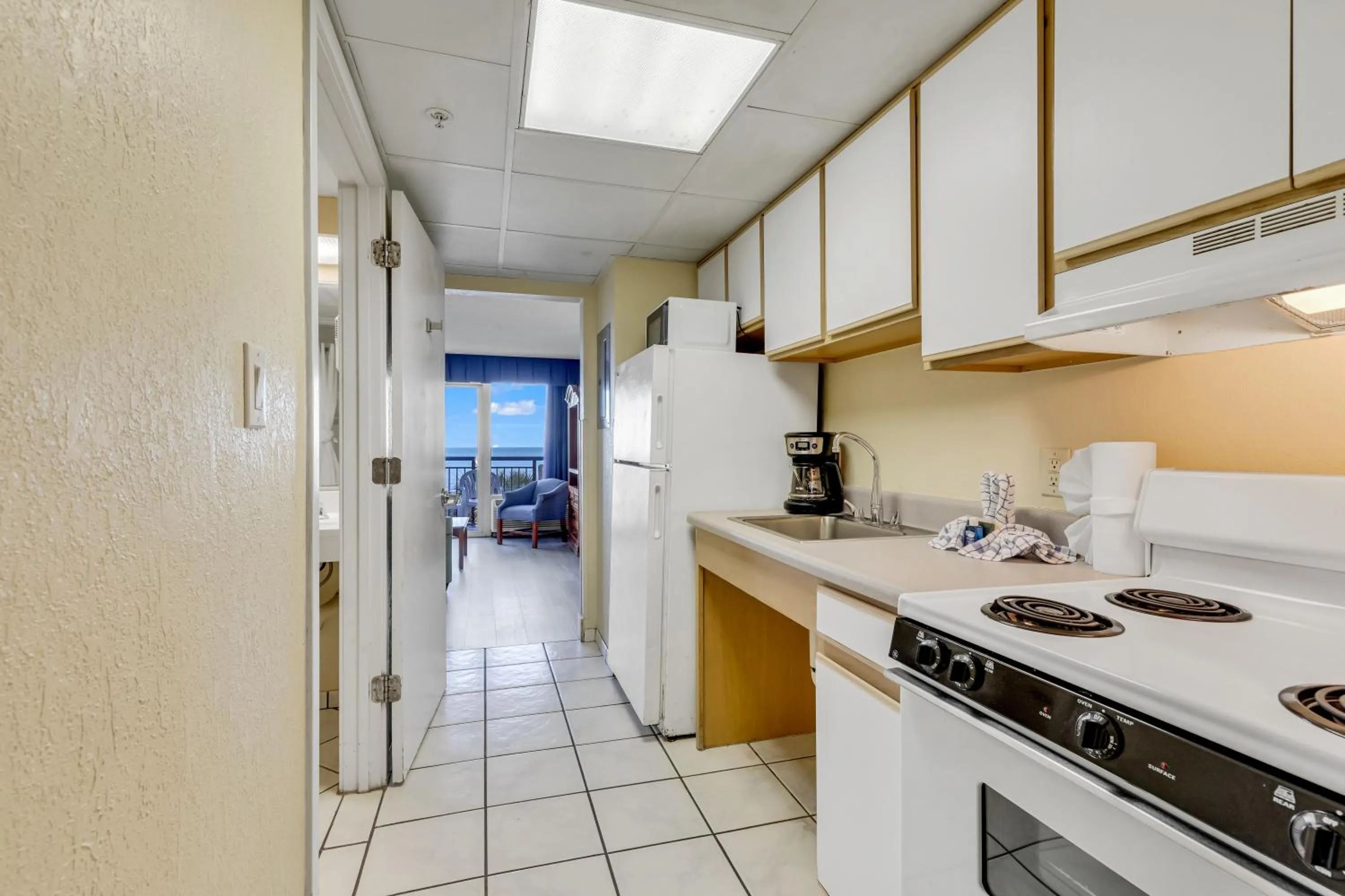 Kitchen or kitchenette in Oceanfront Boardwalk Condo w Private Balcony and Beach
