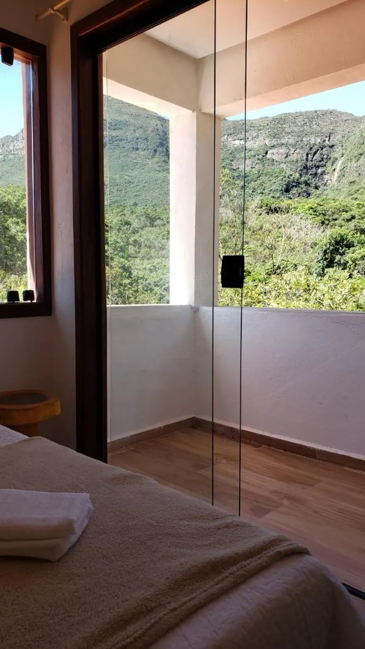 Natural landscape, Bed in Pousada Canto das Cachoeiras