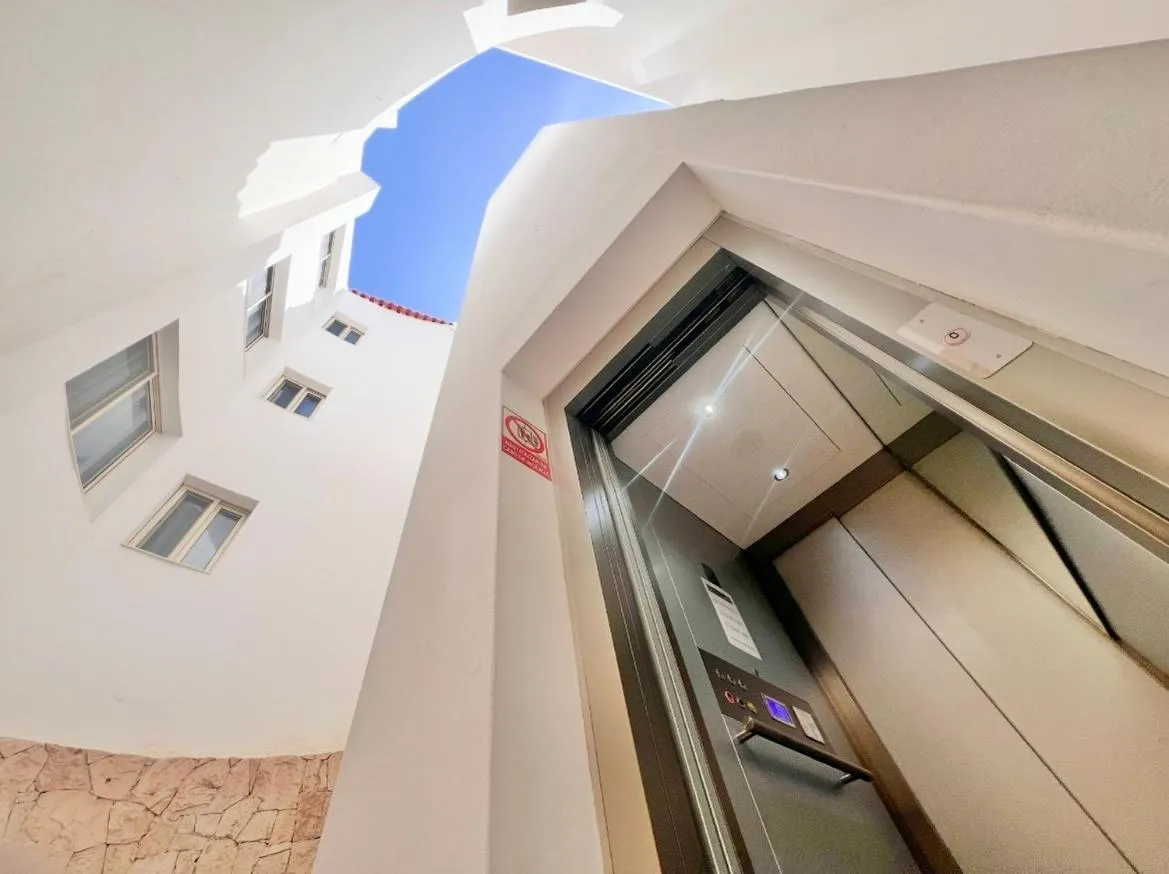 elevator in Branco Suites - Rooms & Holiday Apartments