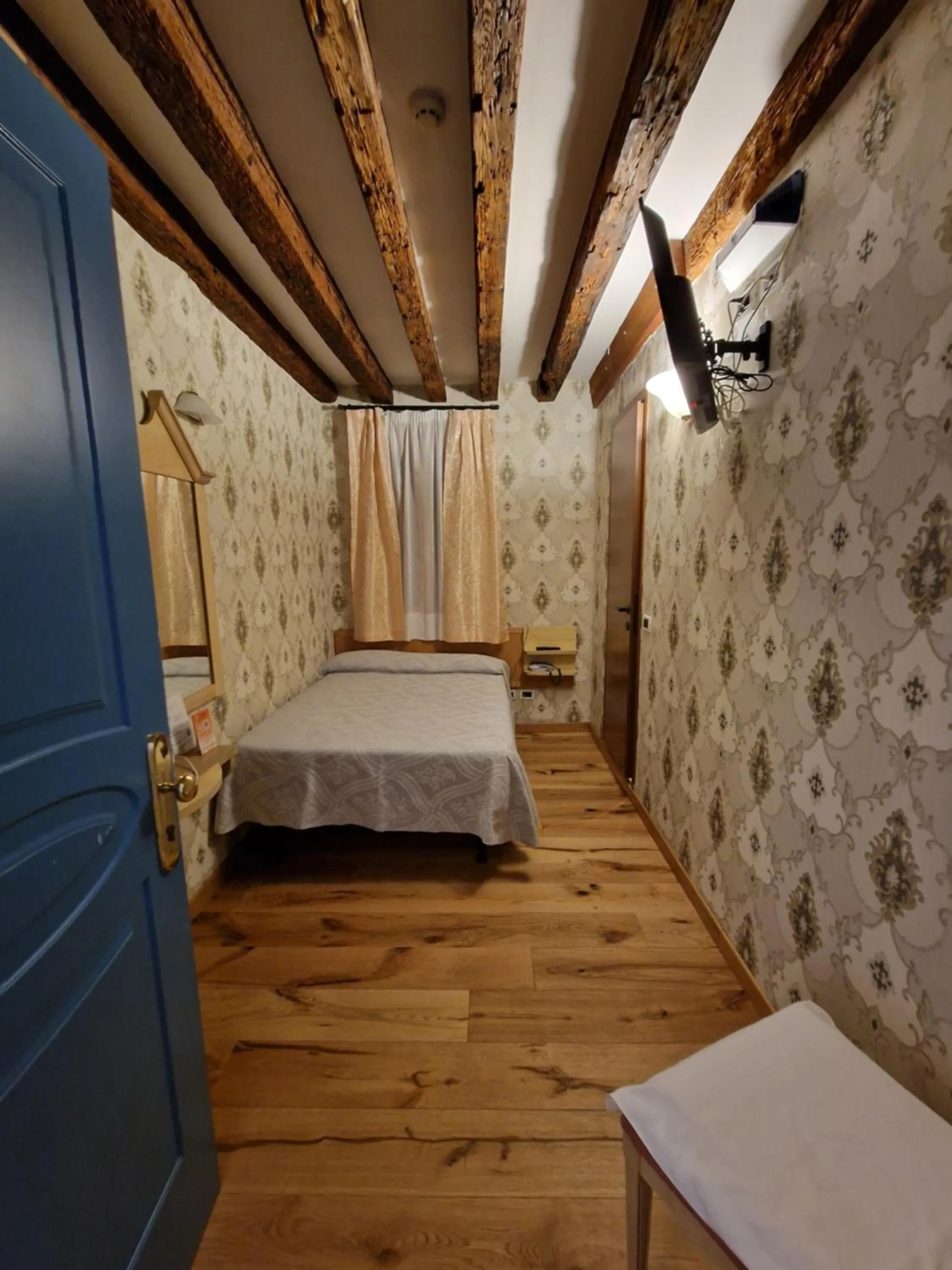 Bed in Hotel Tintoretto