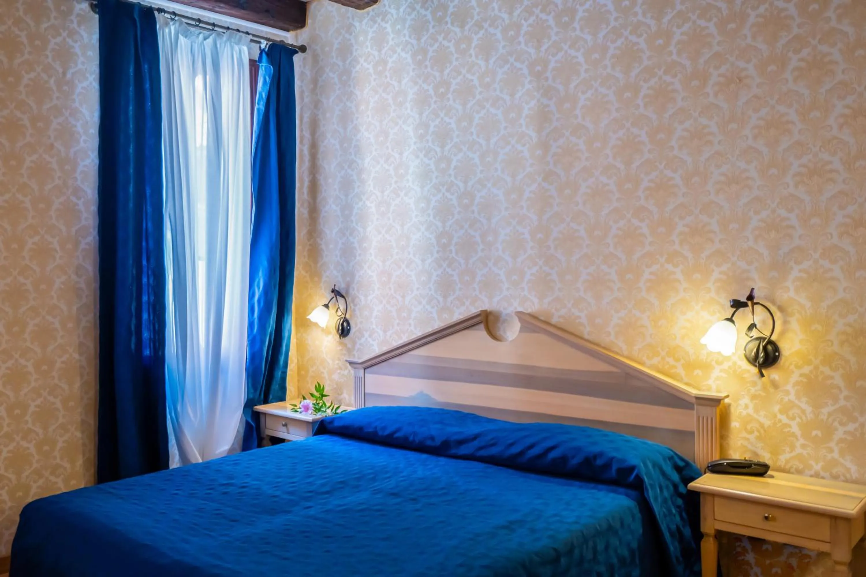 Bed in Hotel Tintoretto