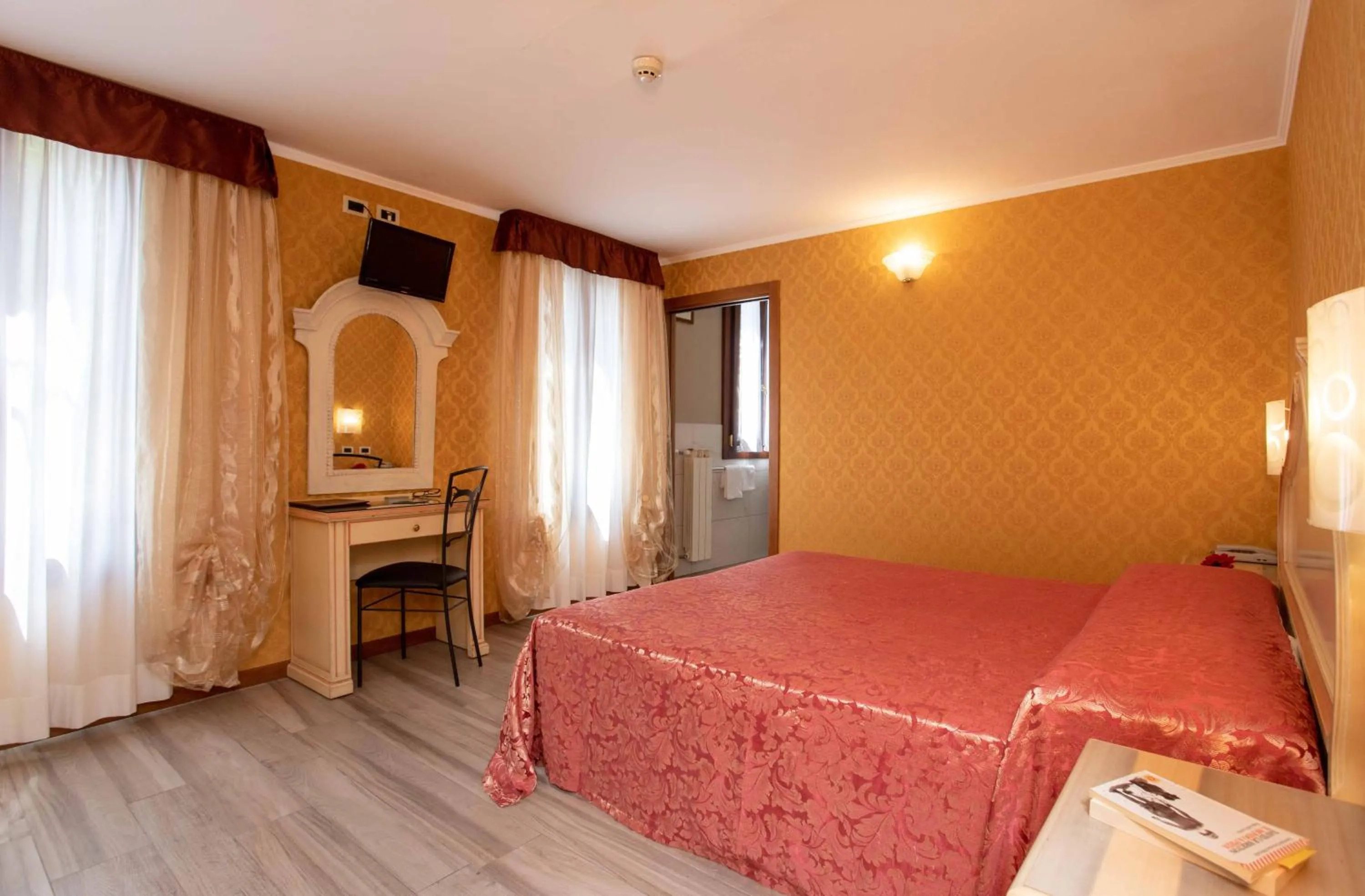 Bed in Hotel Tintoretto