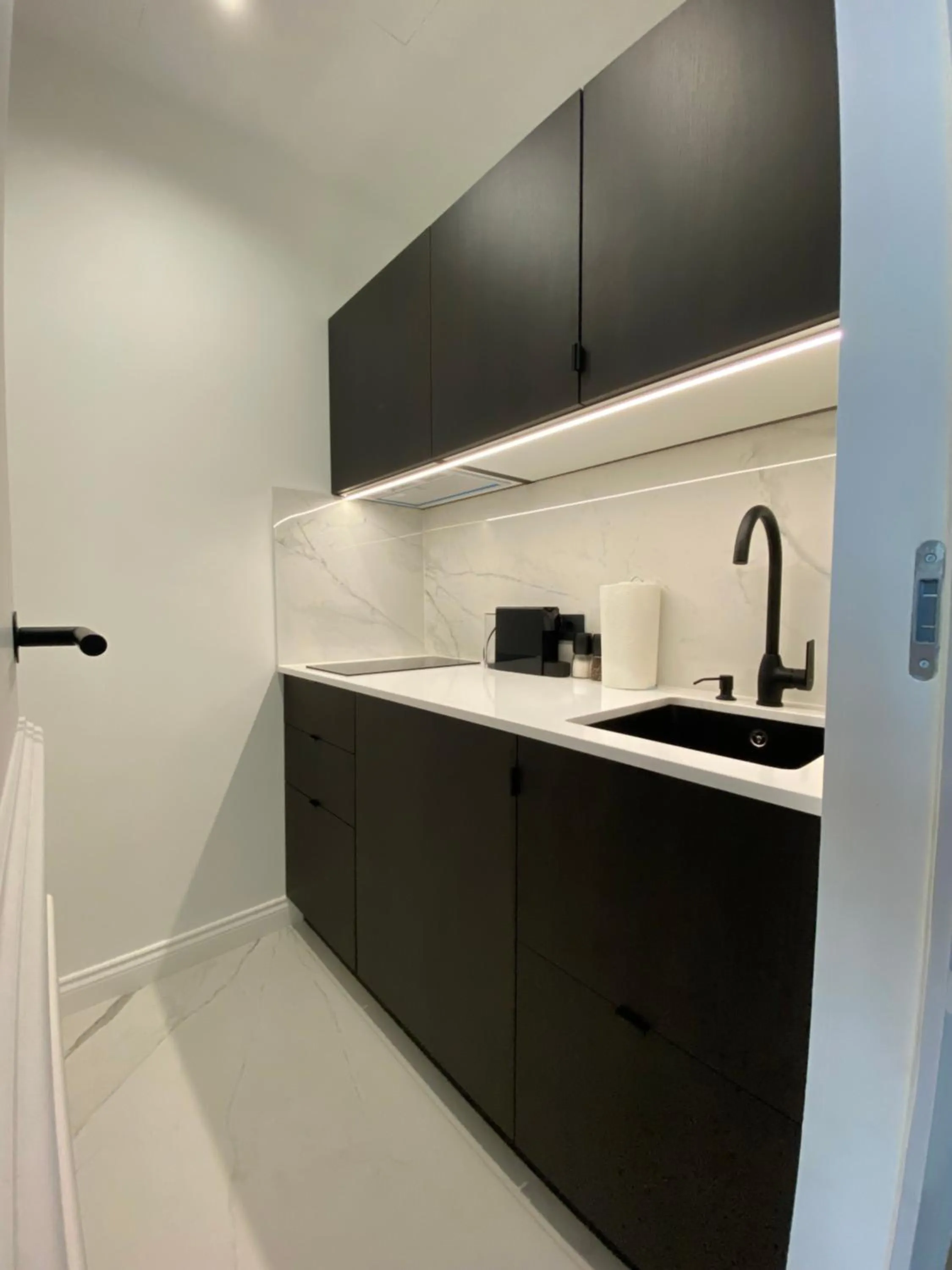 Kitchen or kitchenette in Fingerprint Luxury Apartments