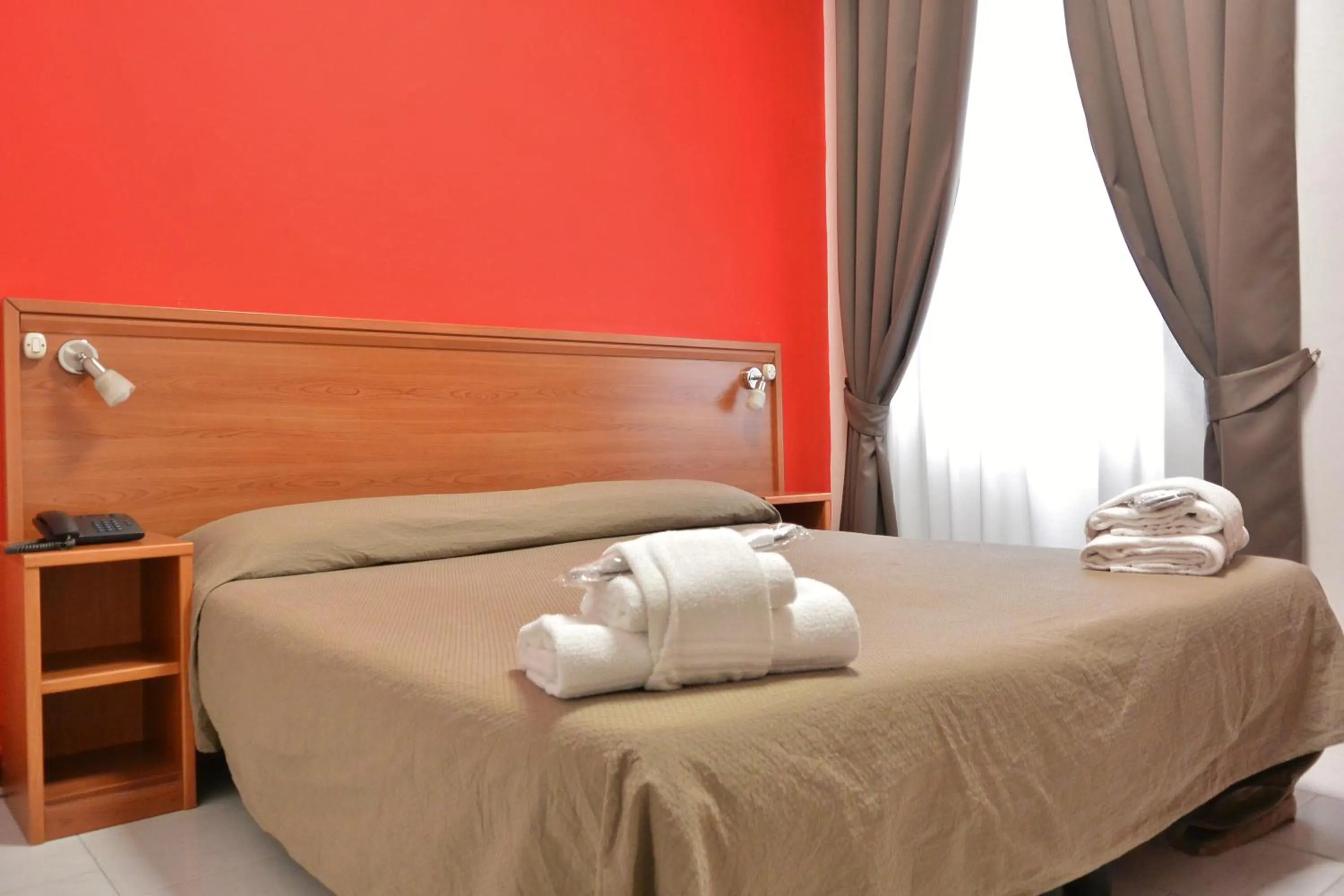 Bed in Hotel Trentina