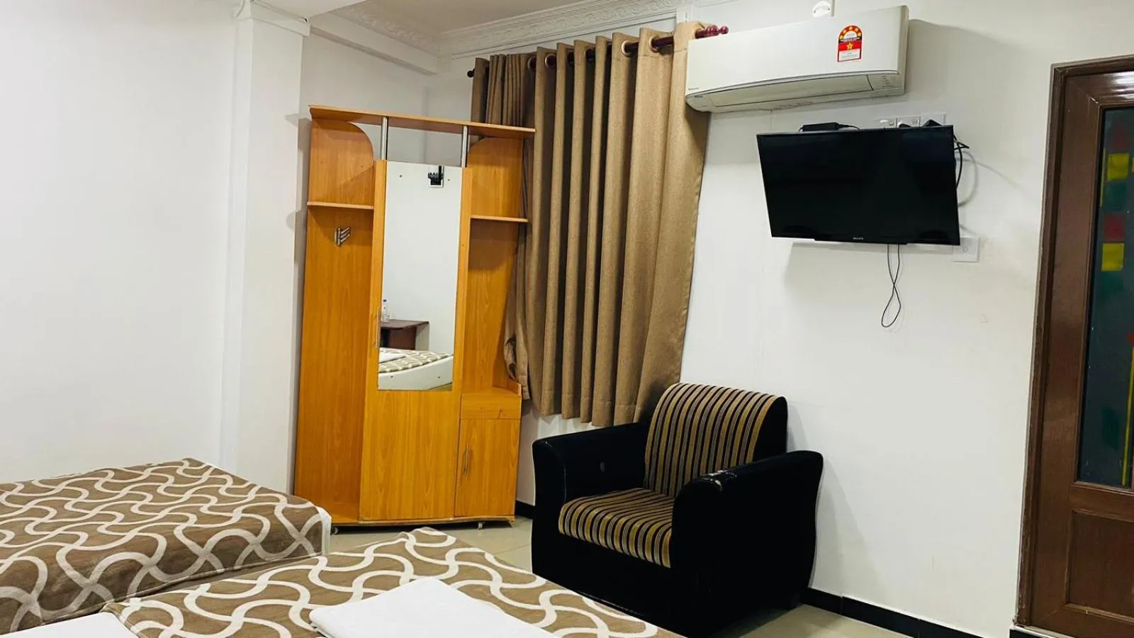 Bed in Saasha City Hotel