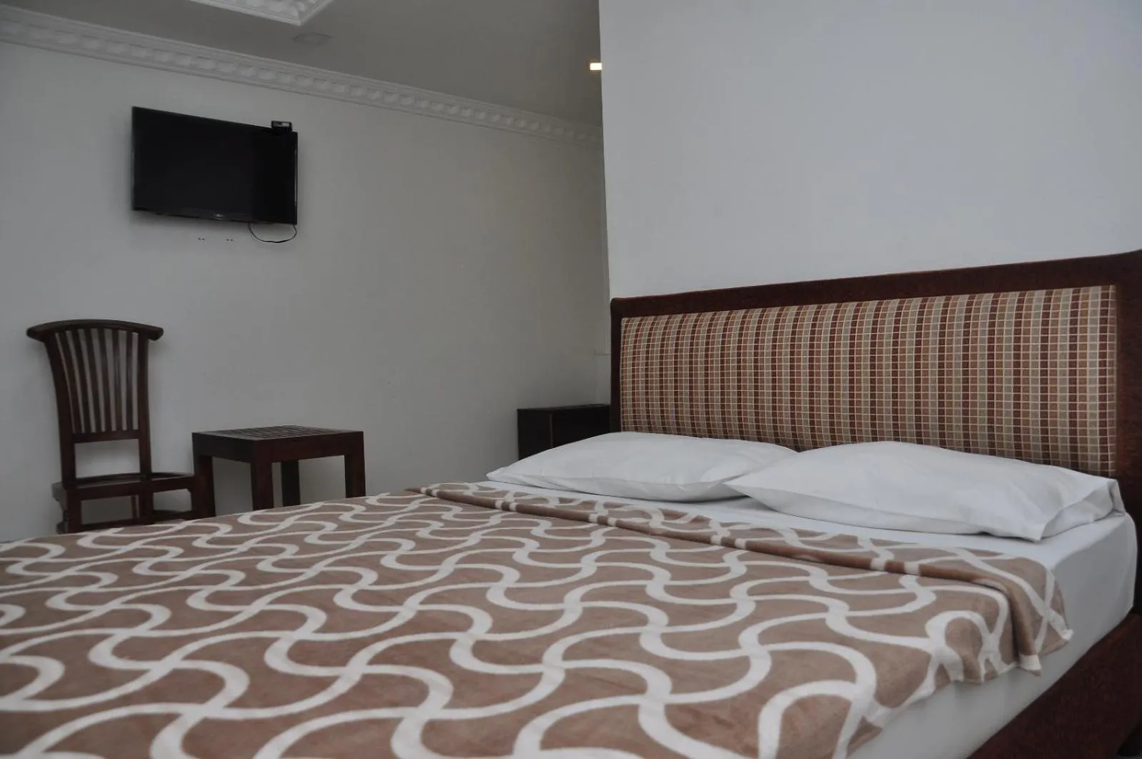 Bed in Saasha City Hotel