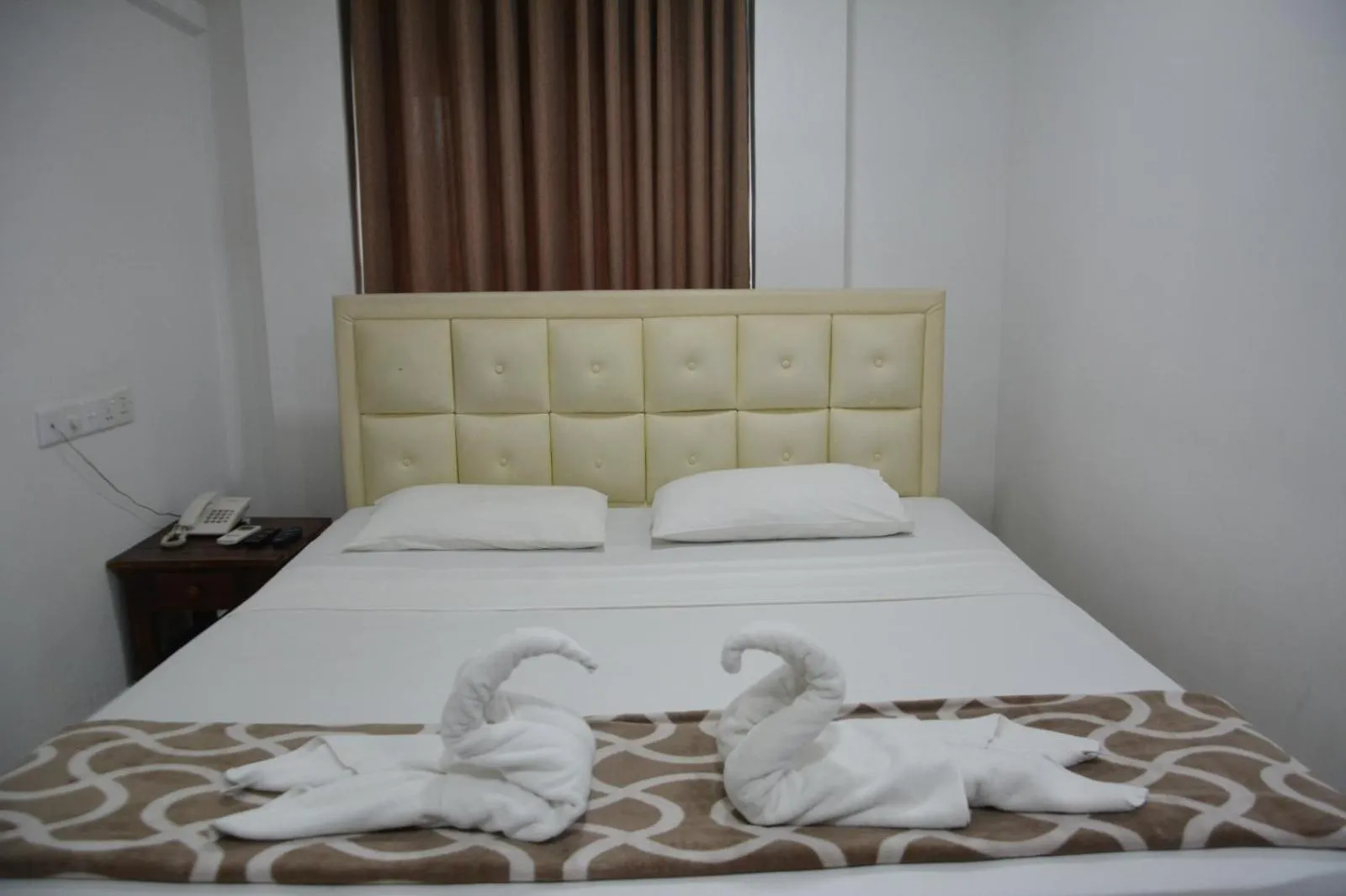 Bed in Saasha City Hotel