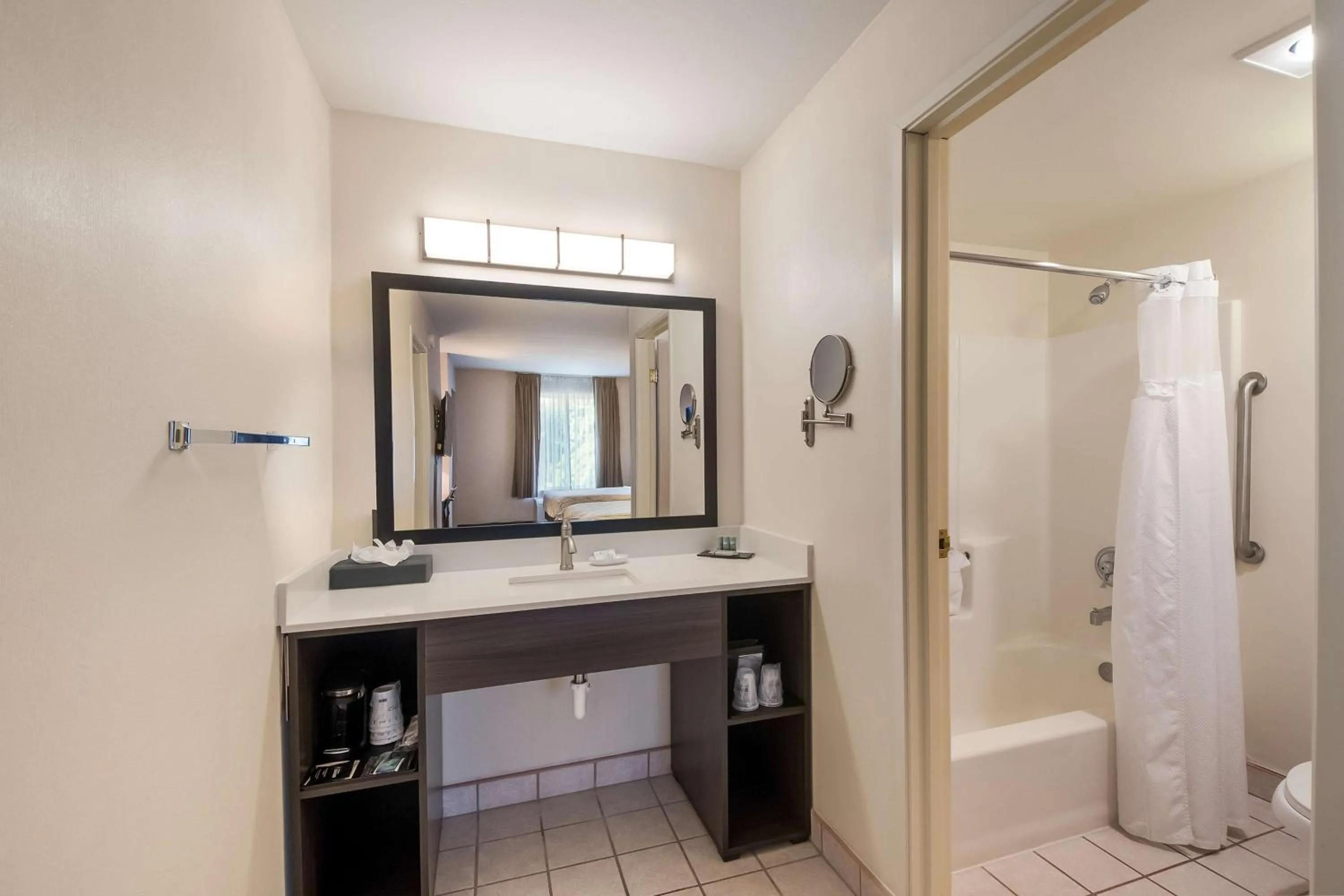 Bathroom in SureStay Plus Hotel by Best Western SeaTac Airport