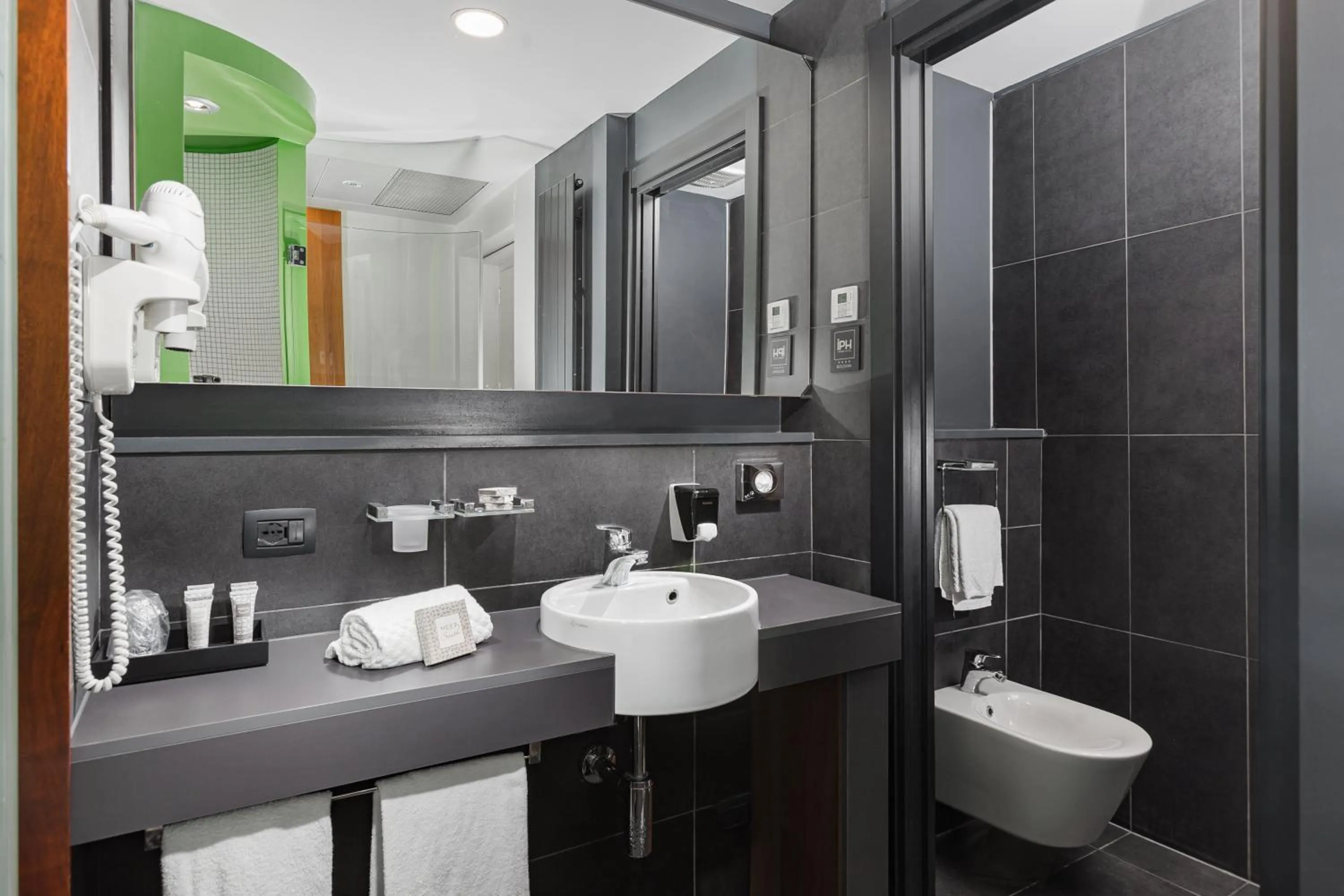 Bathroom in NEW IPOINT HOTEL