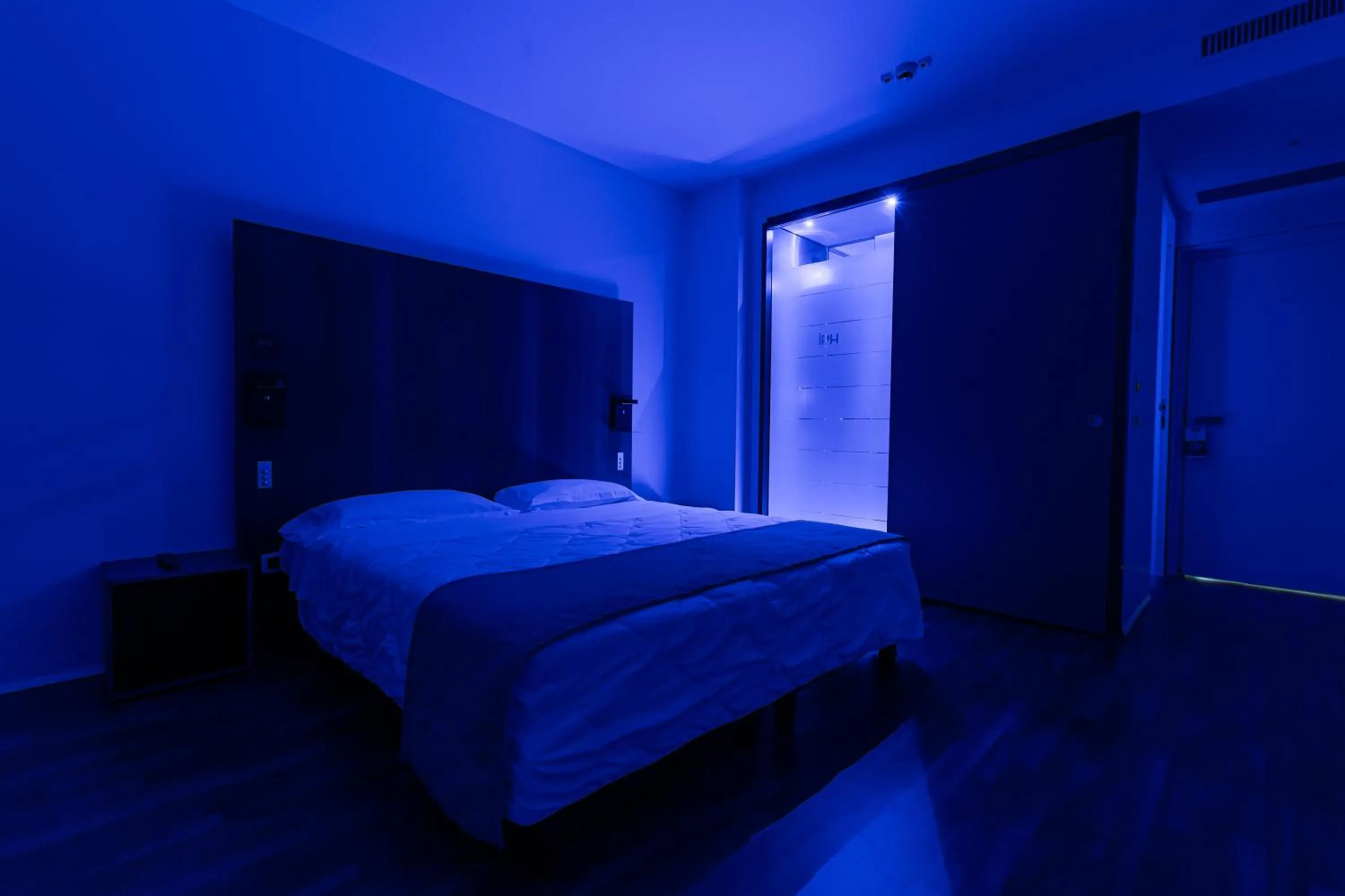 Bed in NEW IPOINT HOTEL