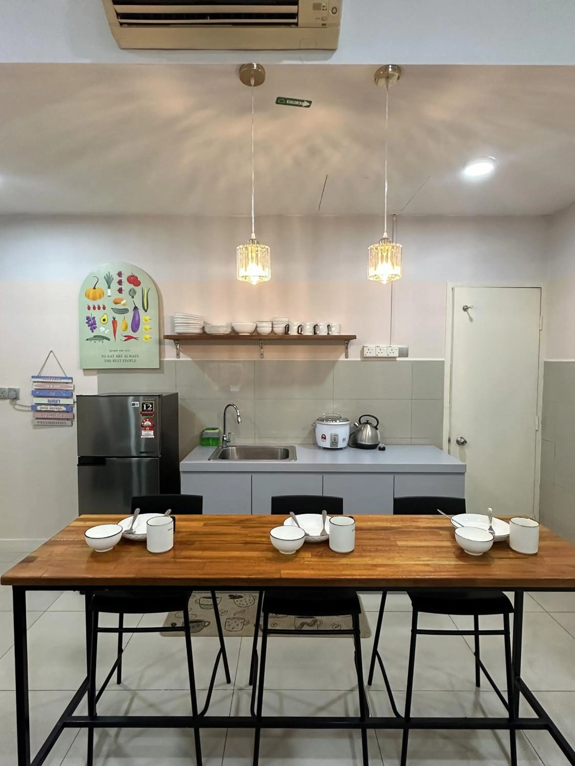 Kitchen or kitchenette in Mari Mari Homestay - IMAGO THE LOFT