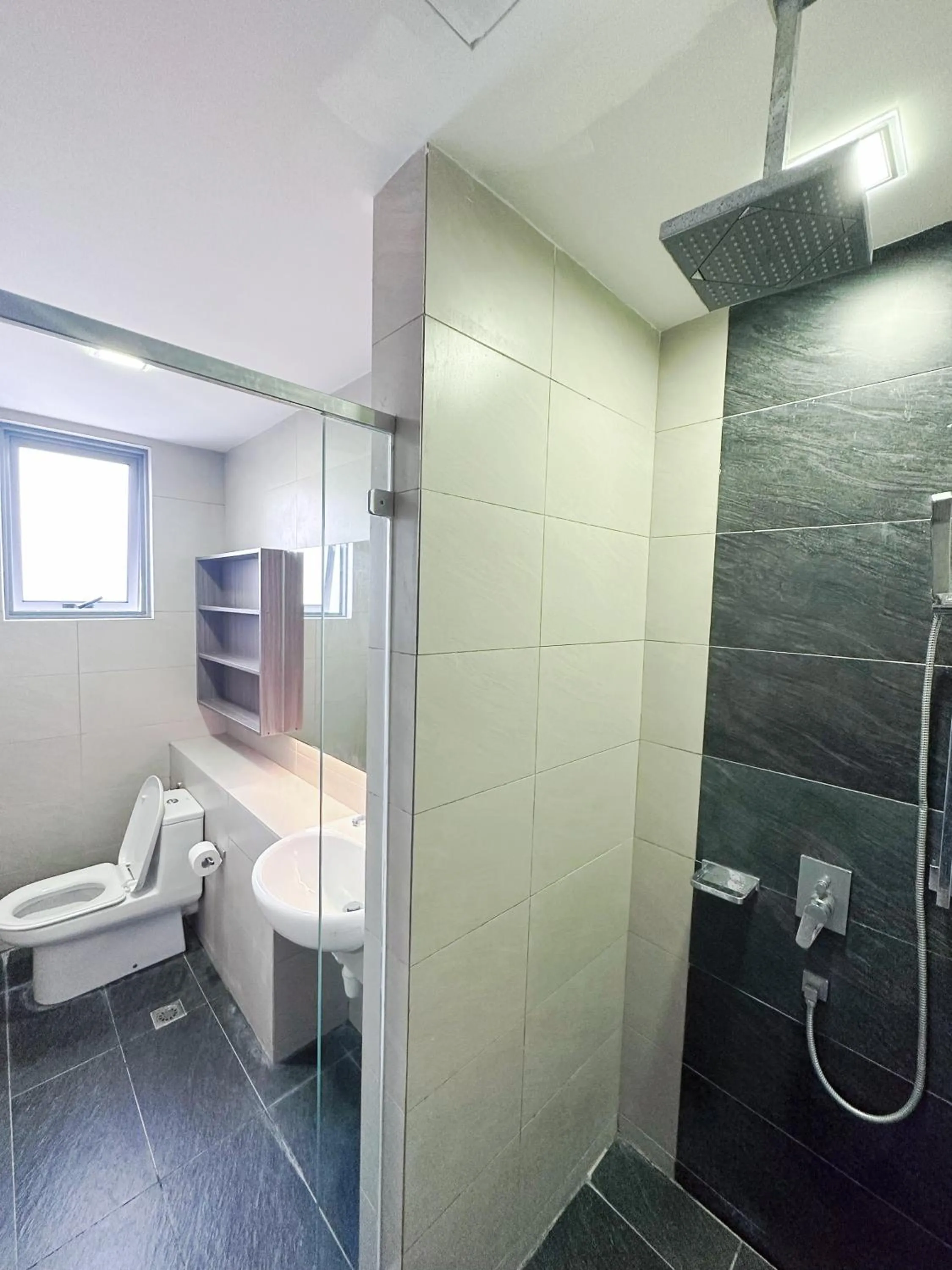 Shower in Mari Mari Homestay - IMAGO THE LOFT