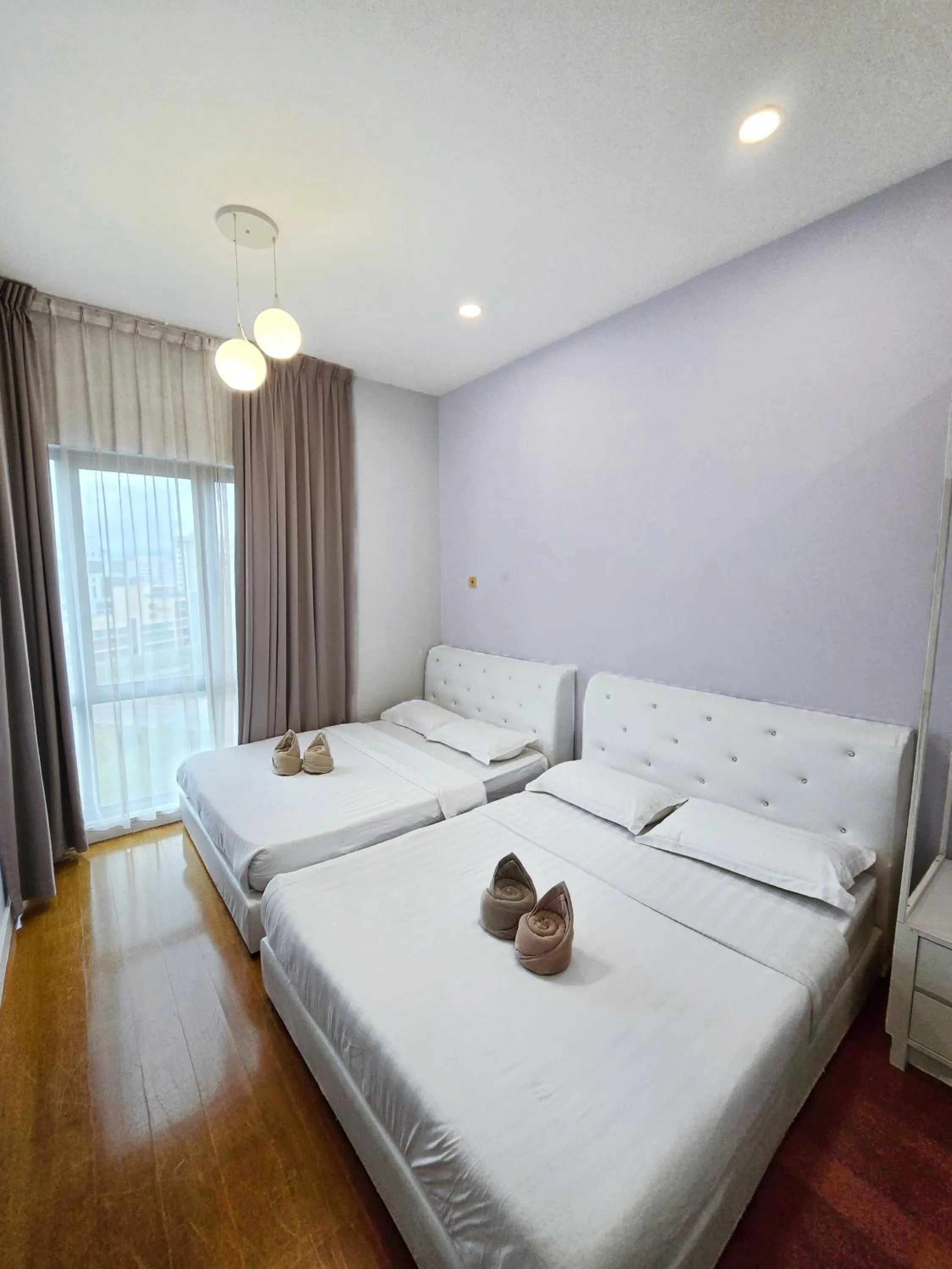 Bed in Mari Mari Homestay - IMAGO THE LOFT