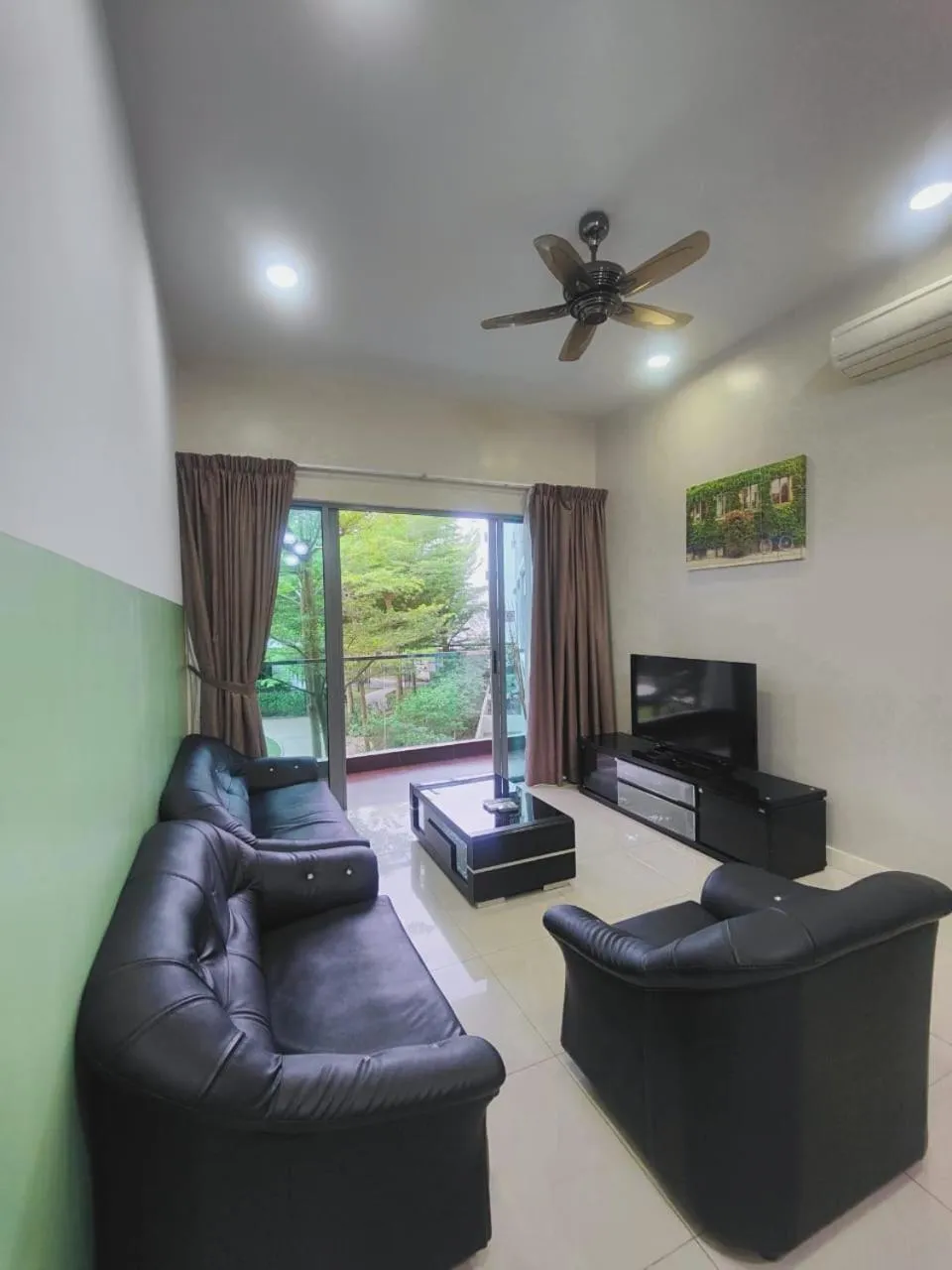 Living room in Mari Mari Homestay - IMAGO THE LOFT