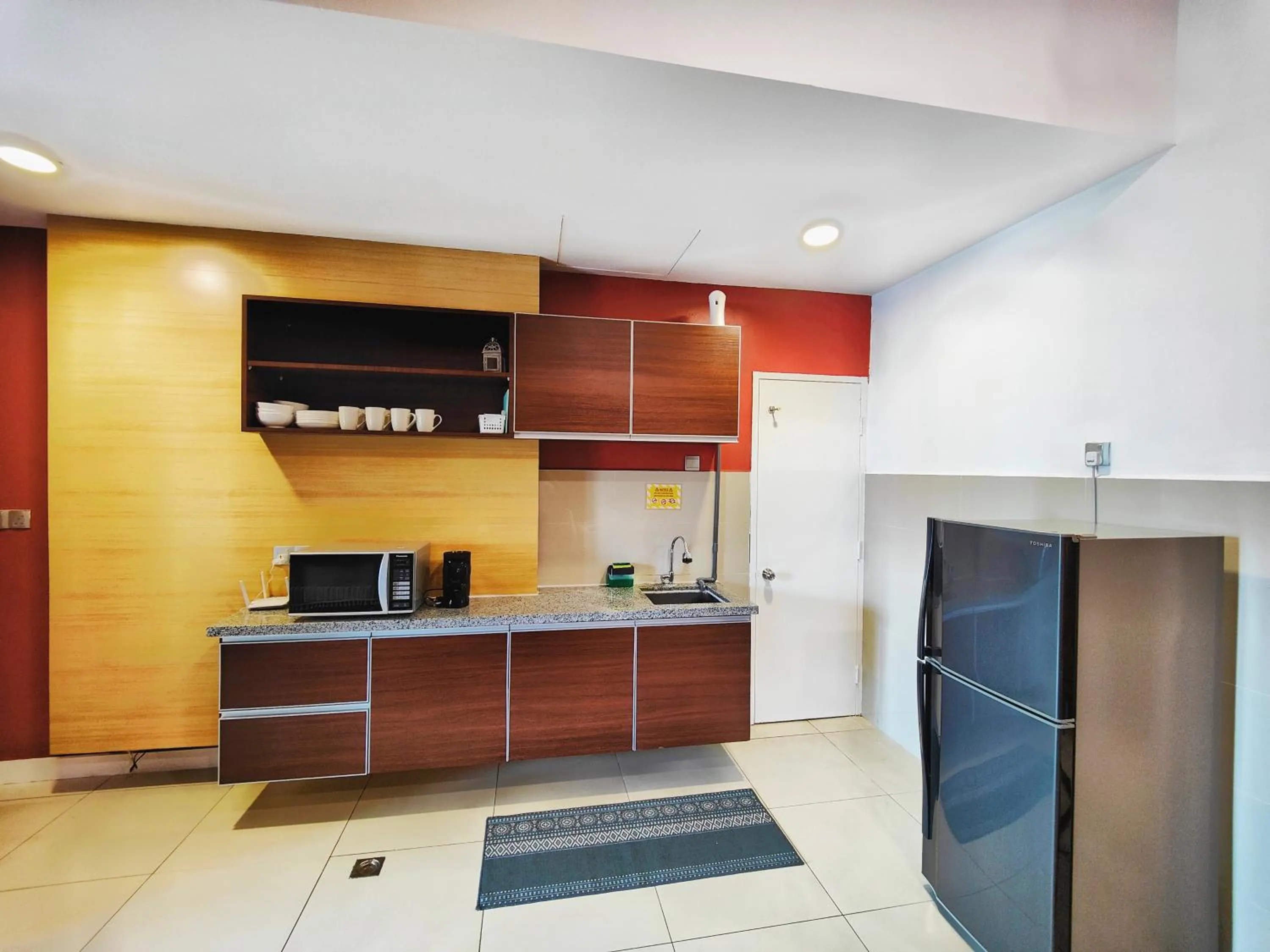 Kitchen or kitchenette in Mari Mari Homestay - IMAGO THE LOFT