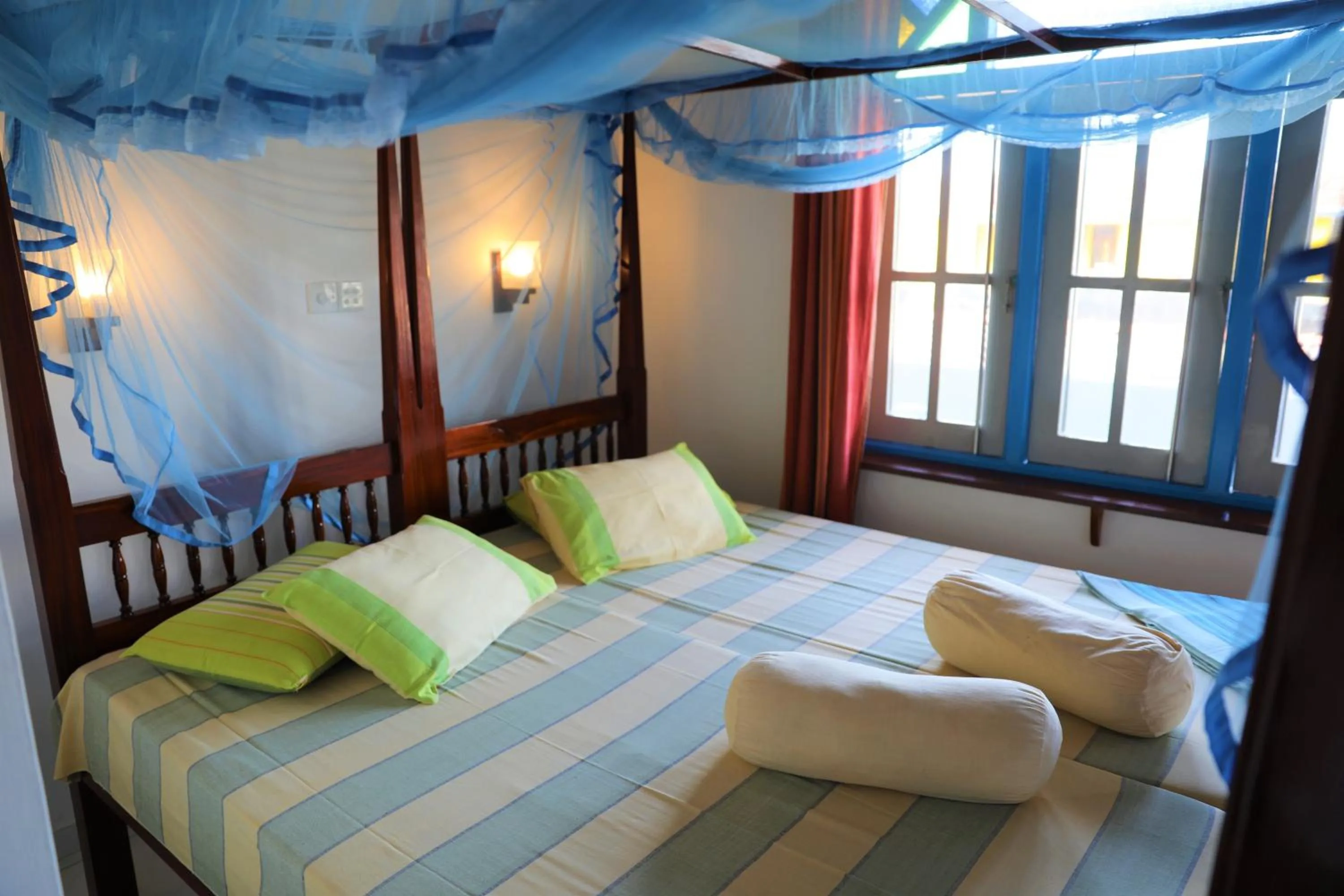 Bed in Main Reef Guest House
