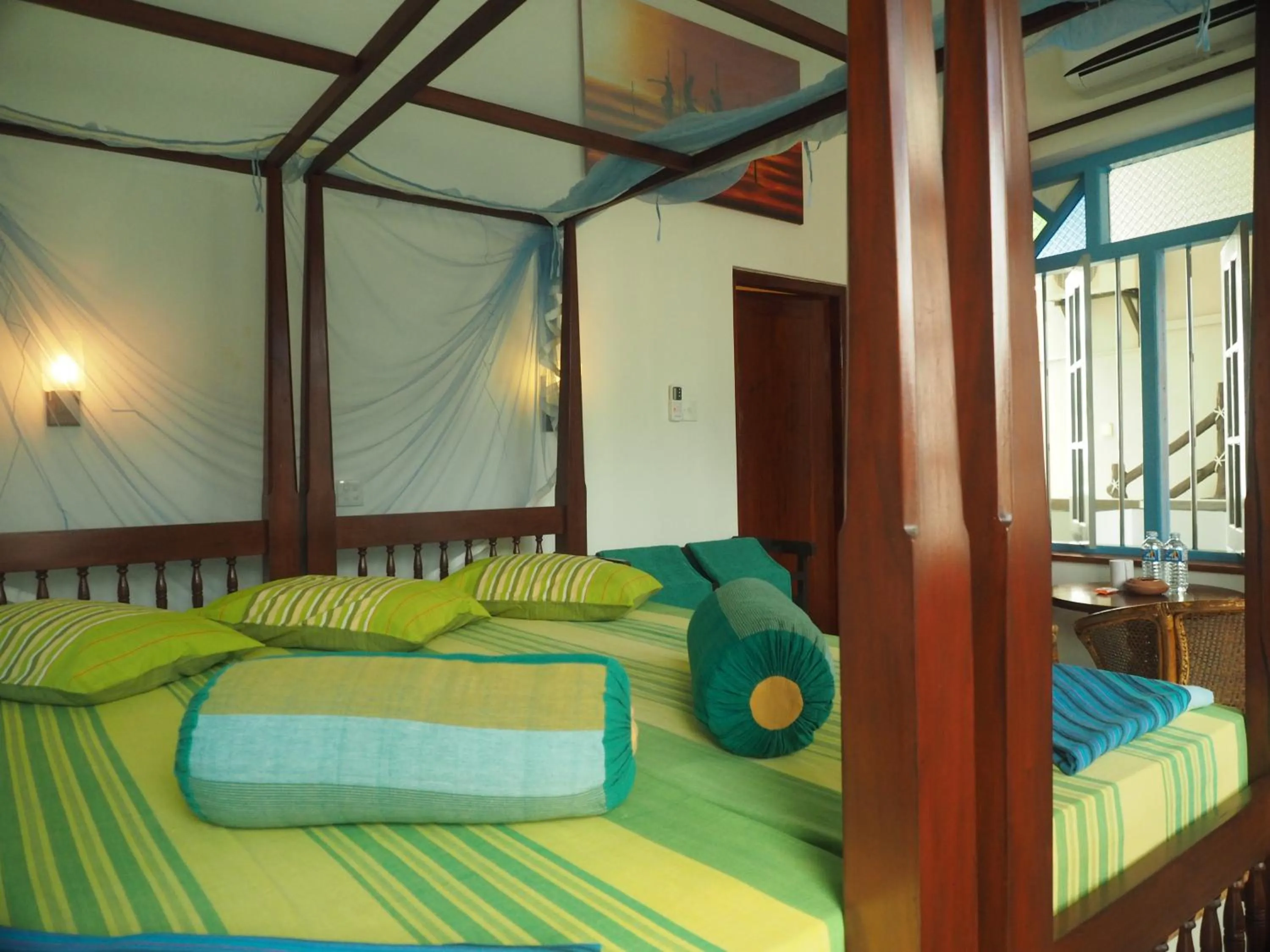 Bed in Main Reef Guest House