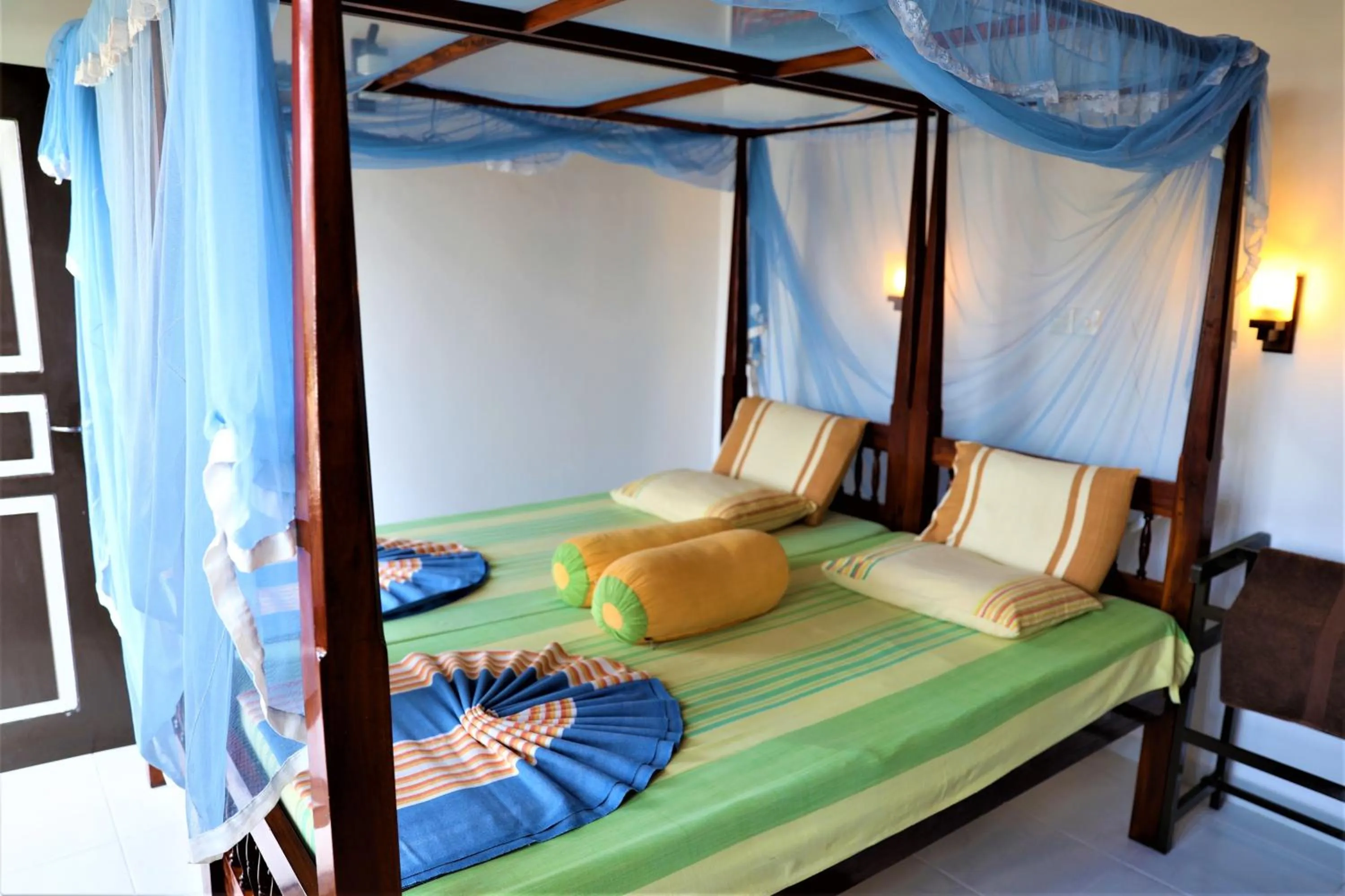 Bed in Main Reef Guest House